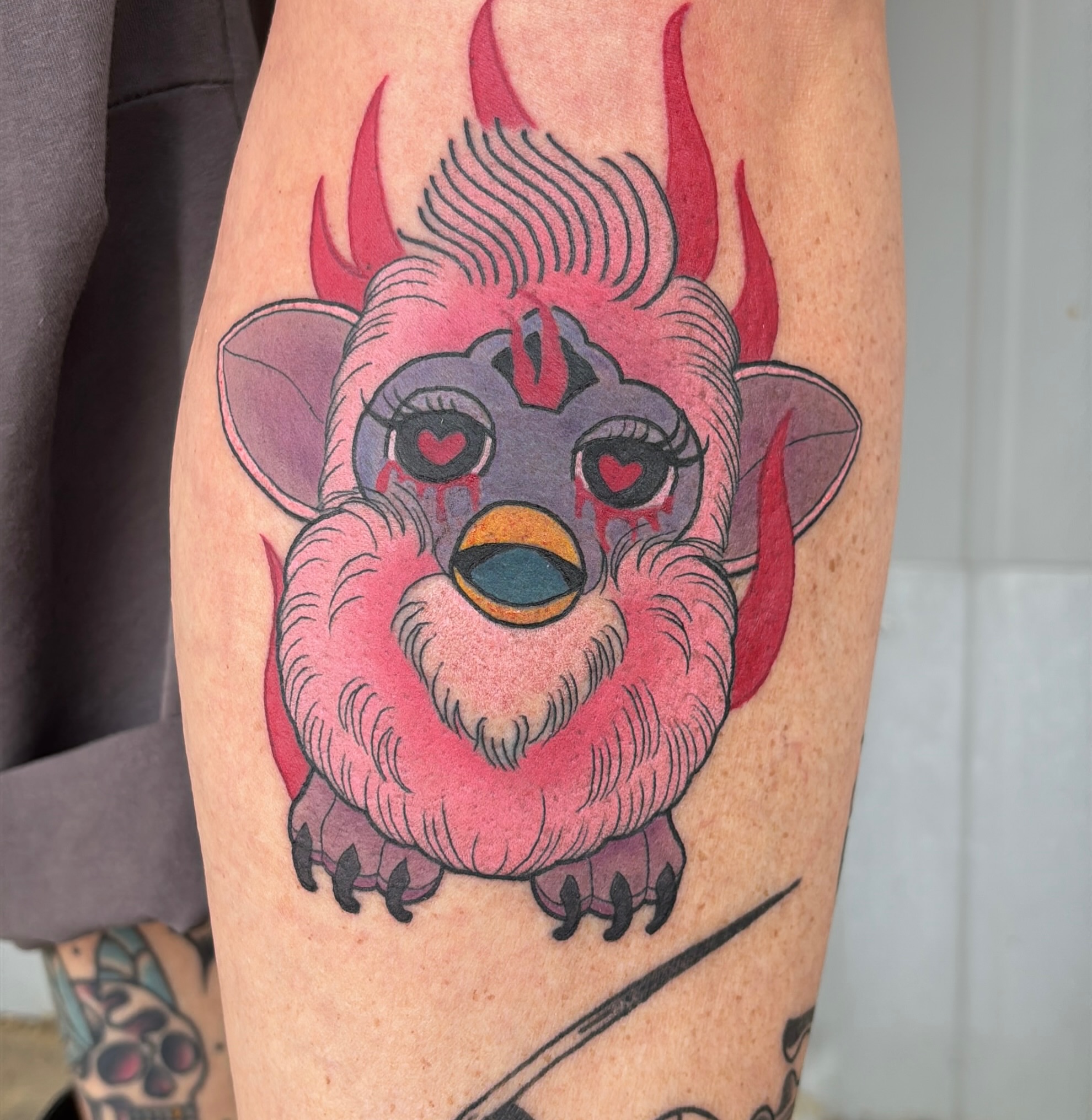 Monster dotwork tattoo on the thigh by Latesha Burnley