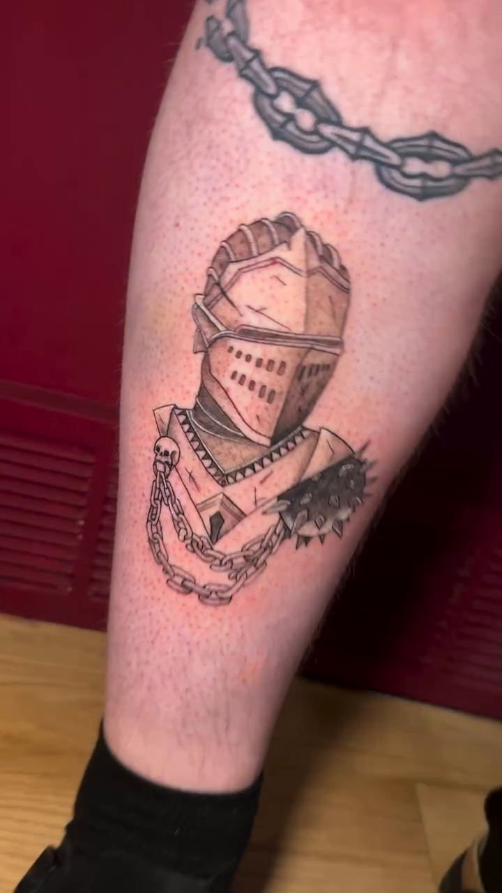 Knight's helmet realism tattoo by @inkedbybanti