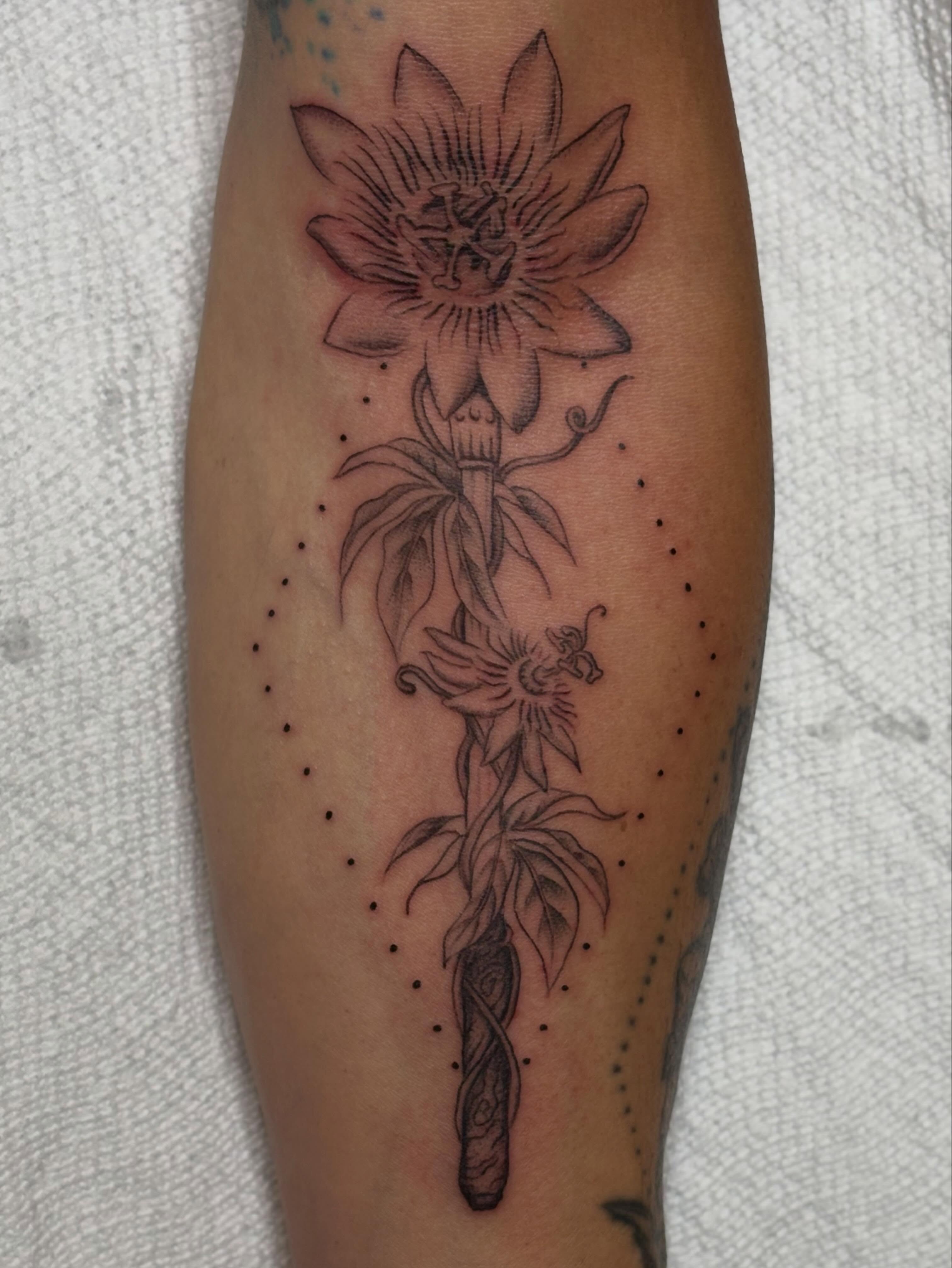 Flower and skull dotwork tattoo on the calf by ☻︎ Cyd Precious ☹︎
