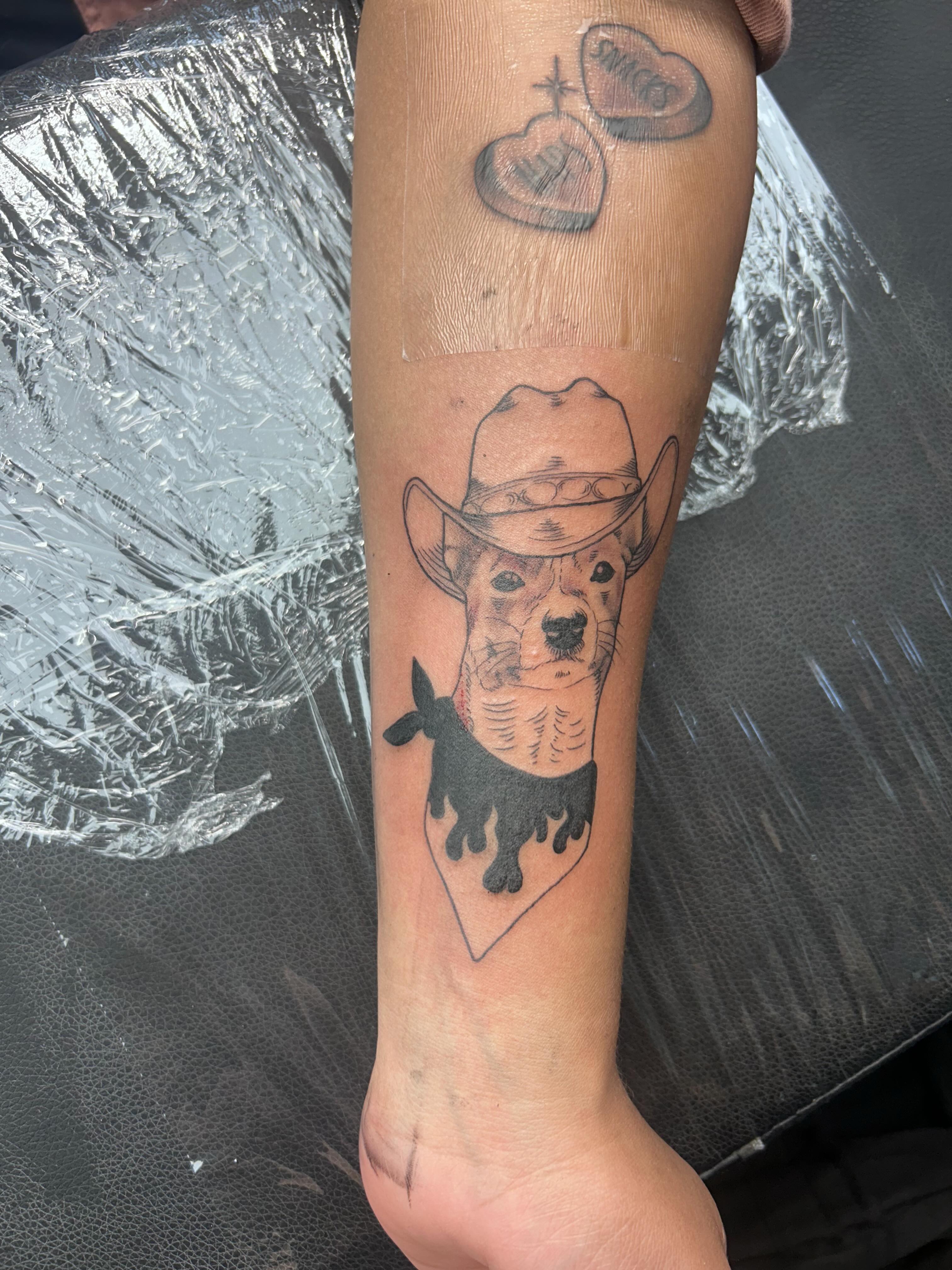 Cowboy dog realism tattoo on the forearm by Ricardo (RJ)