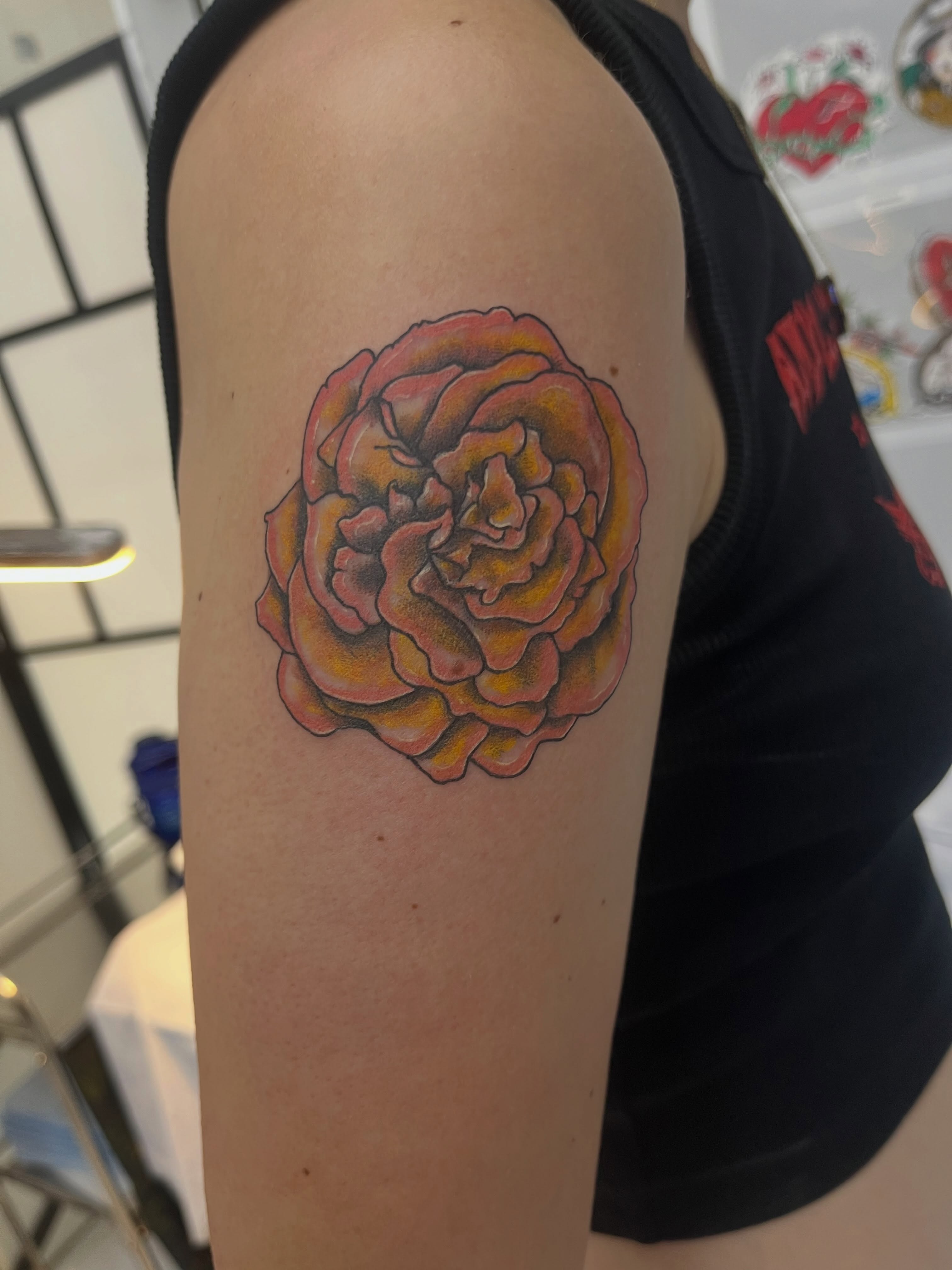 Peony realism tattoo on the upper arm by Sour Tattoo, Somerville, Massachusetts