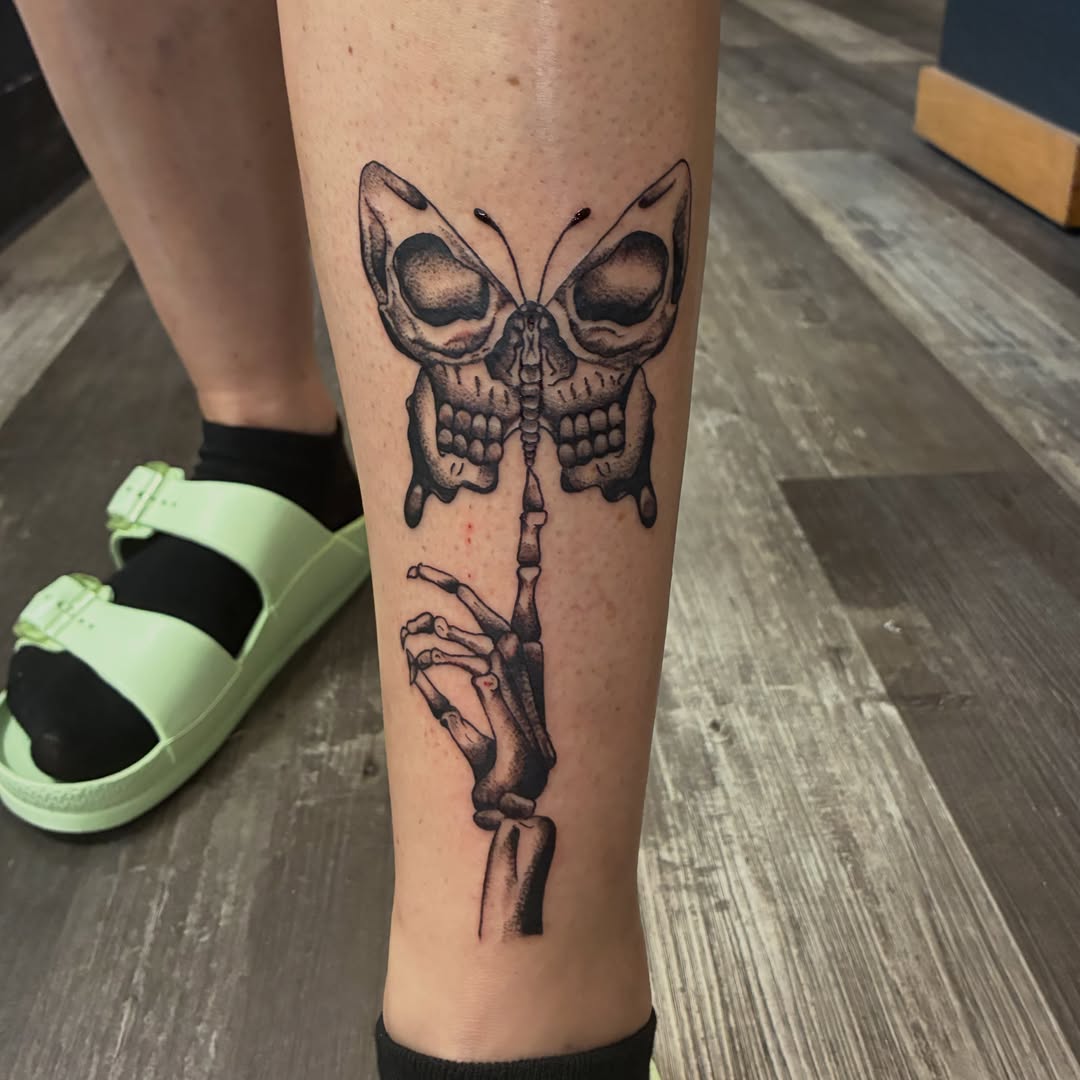 Skull butterfly realism tattoo on the forearm by Hit & Run Tattoo, Dayton, Ohio