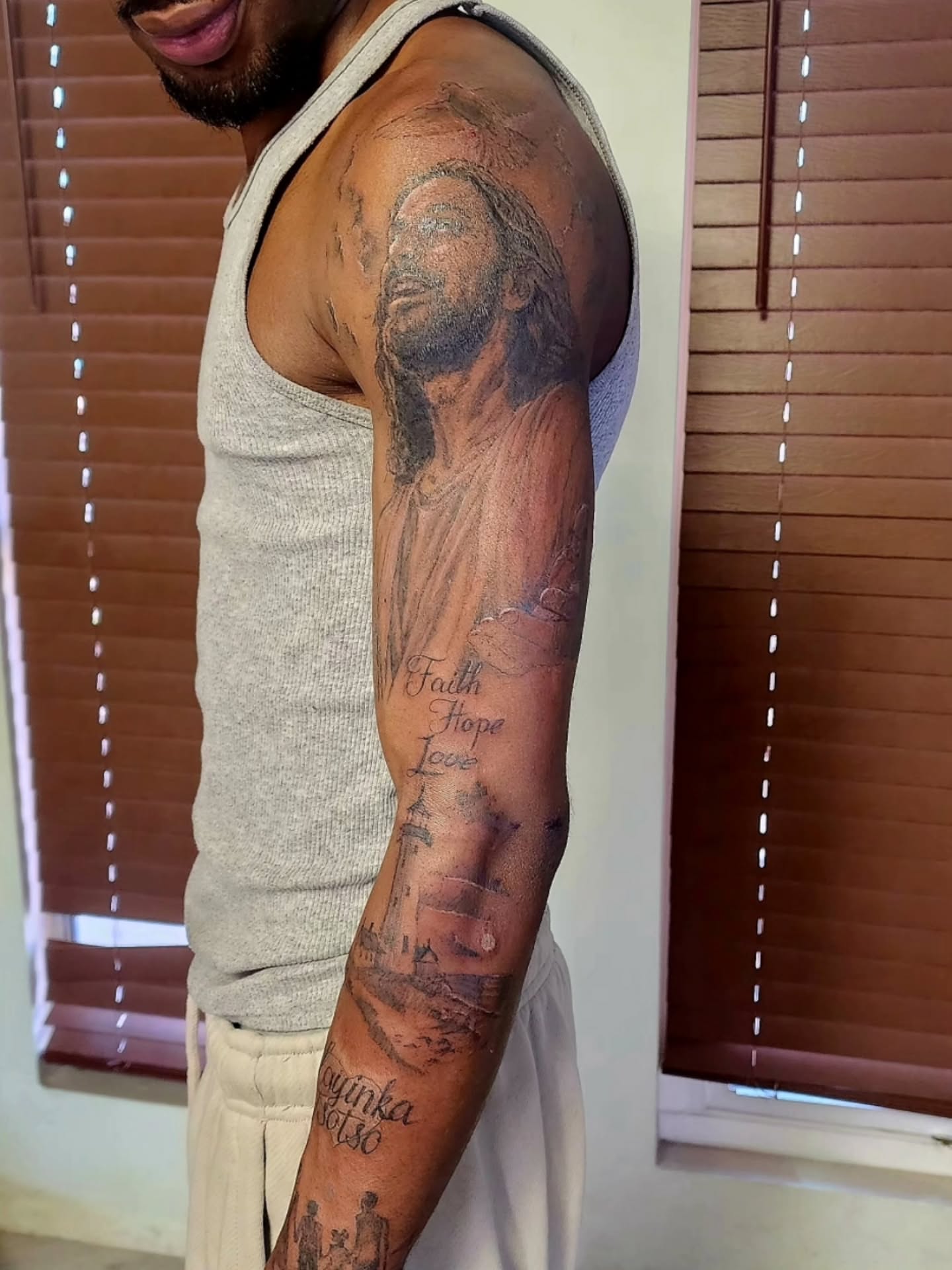 Religious figure realism tattoo on the forearm by Dr. Valerio Vegas Tattoo