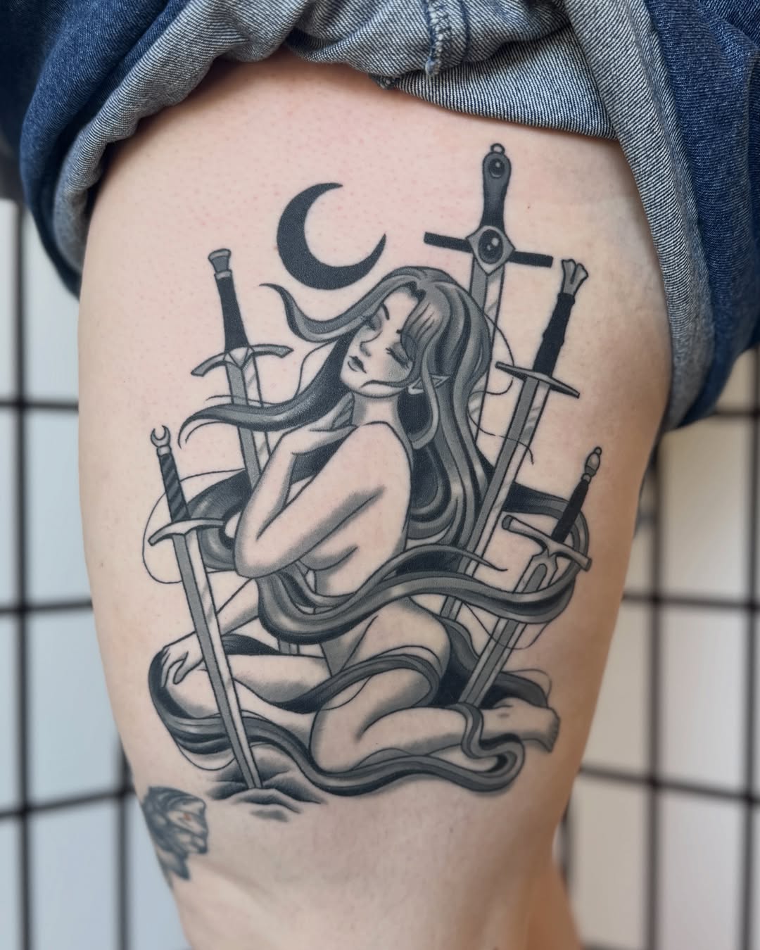 Woman with swords realism tattoo on the thigh by Nia (Knee-uhh) 🦷