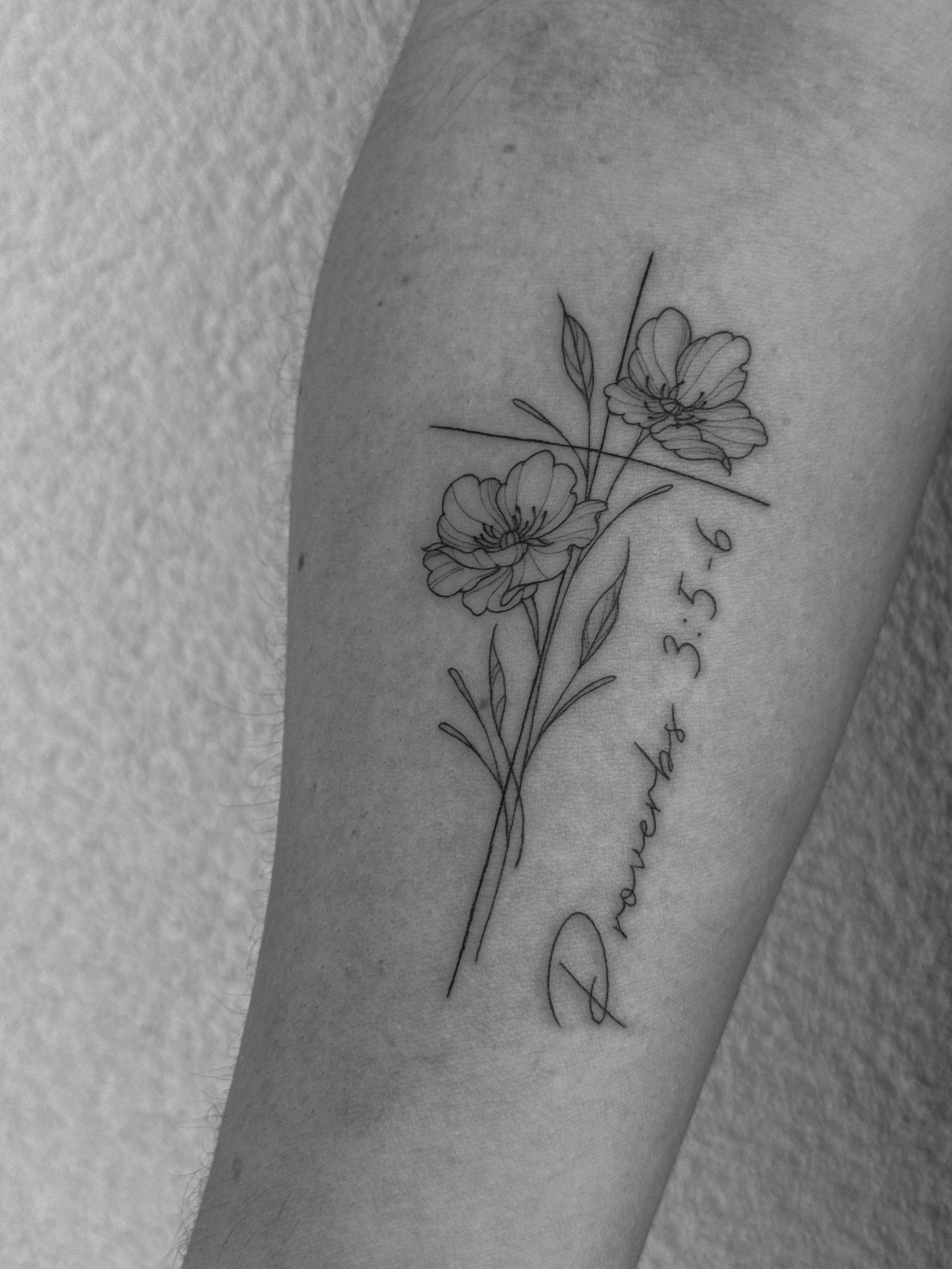 Flowers fine line tattoo on the forearm by Abby Robinson