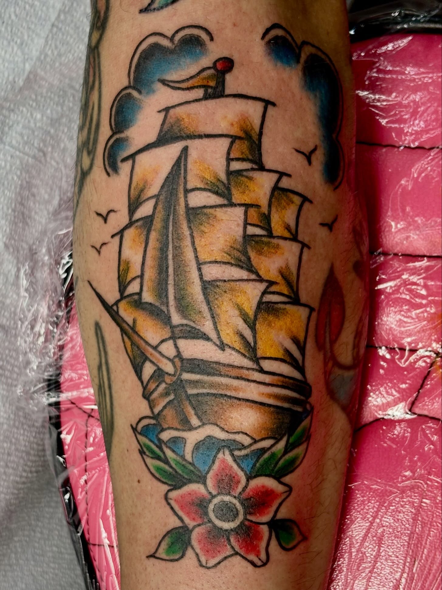 Ship and flower American traditional tattoo on the forearm by ✮ ✄ star ✮ ✄
