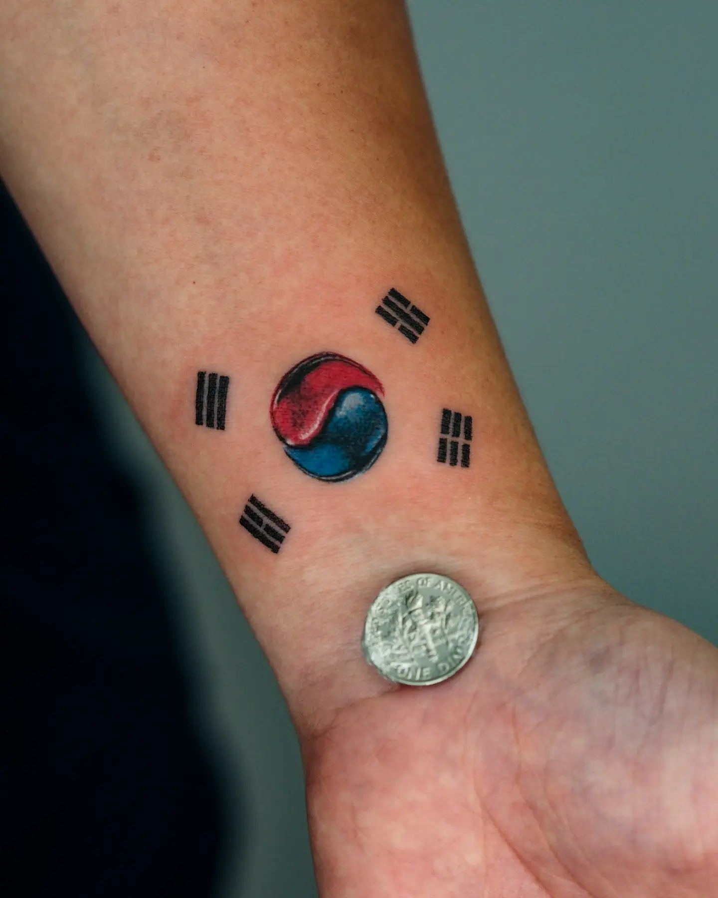 South Korean flag dotwork tattoo on the forearm by MK