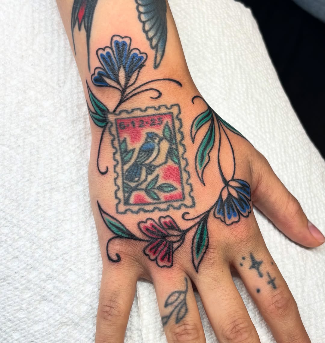 Postage stamp bird American traditional tattoo on the hand by ๐ฅ Jas ๐ฅ