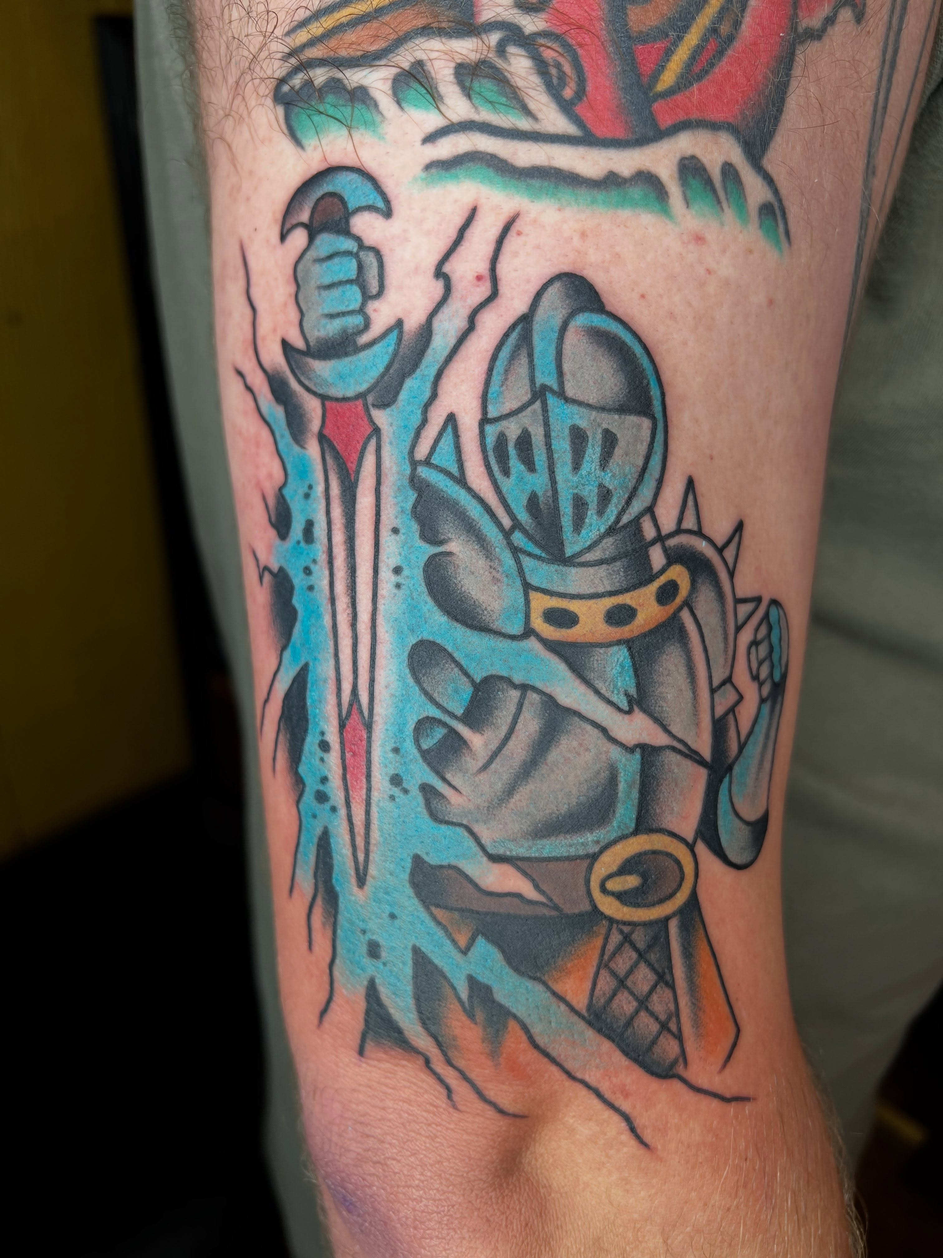 Knight American traditional tattoo on the forearm by Cory Miller