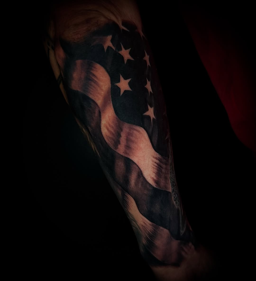 American flag American traditional tattoo on the forearm by Savannah Duff