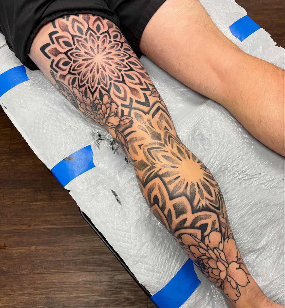 Floral mandala geometric tattoo on the forearm by sydney honn