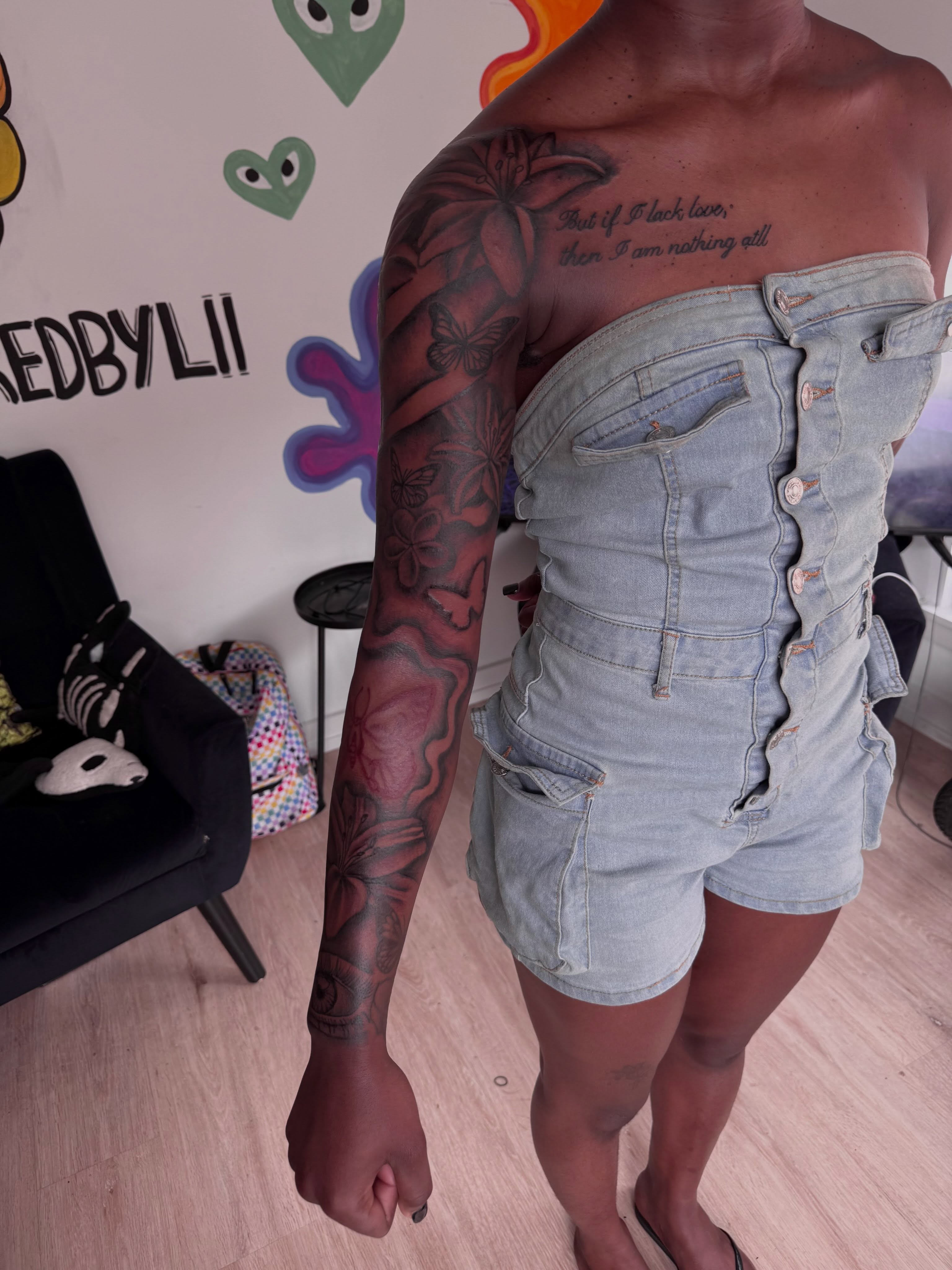Floral and butterfly American traditional tattoo on the forearm by inkedbylii, Philadelphia, Pennsylvania