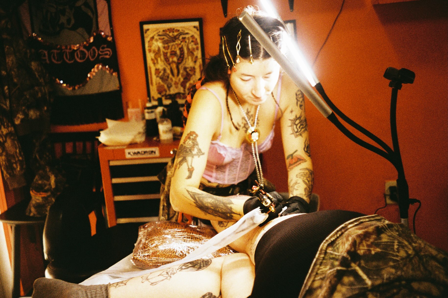 Tattoo artist American traditional tattoo on the torso by Jacqui Rose