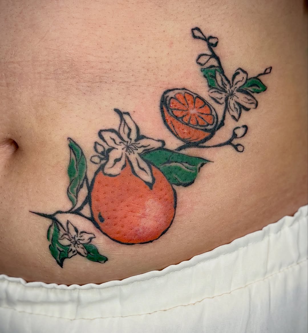 Orange branch with fruit and flowers neo-traditional tattoo on the torso by *:・kelly✧*:・゚