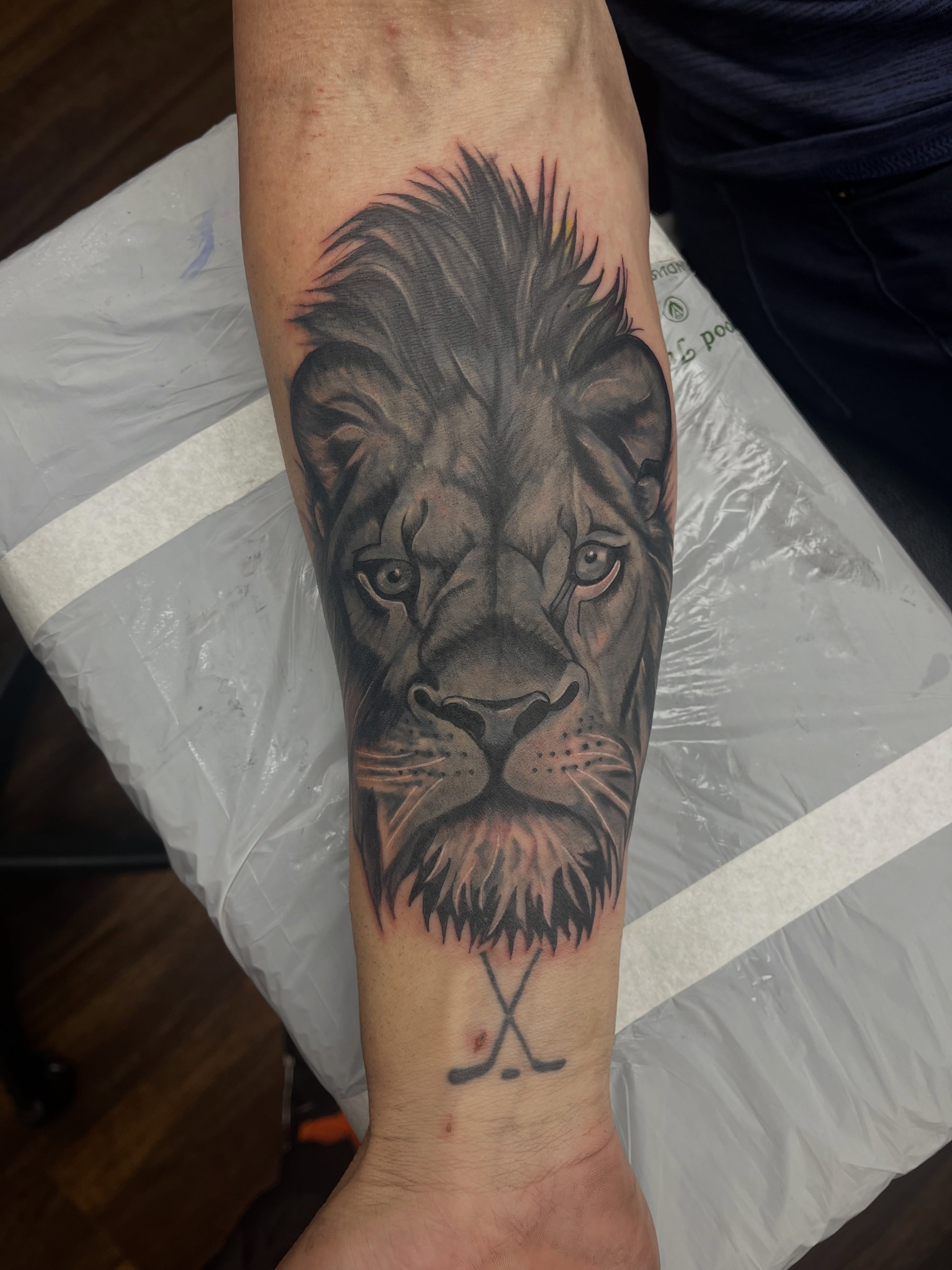 Lion realism tattoo on the forearm by Autumn Westbrook, Mentor, Ohio