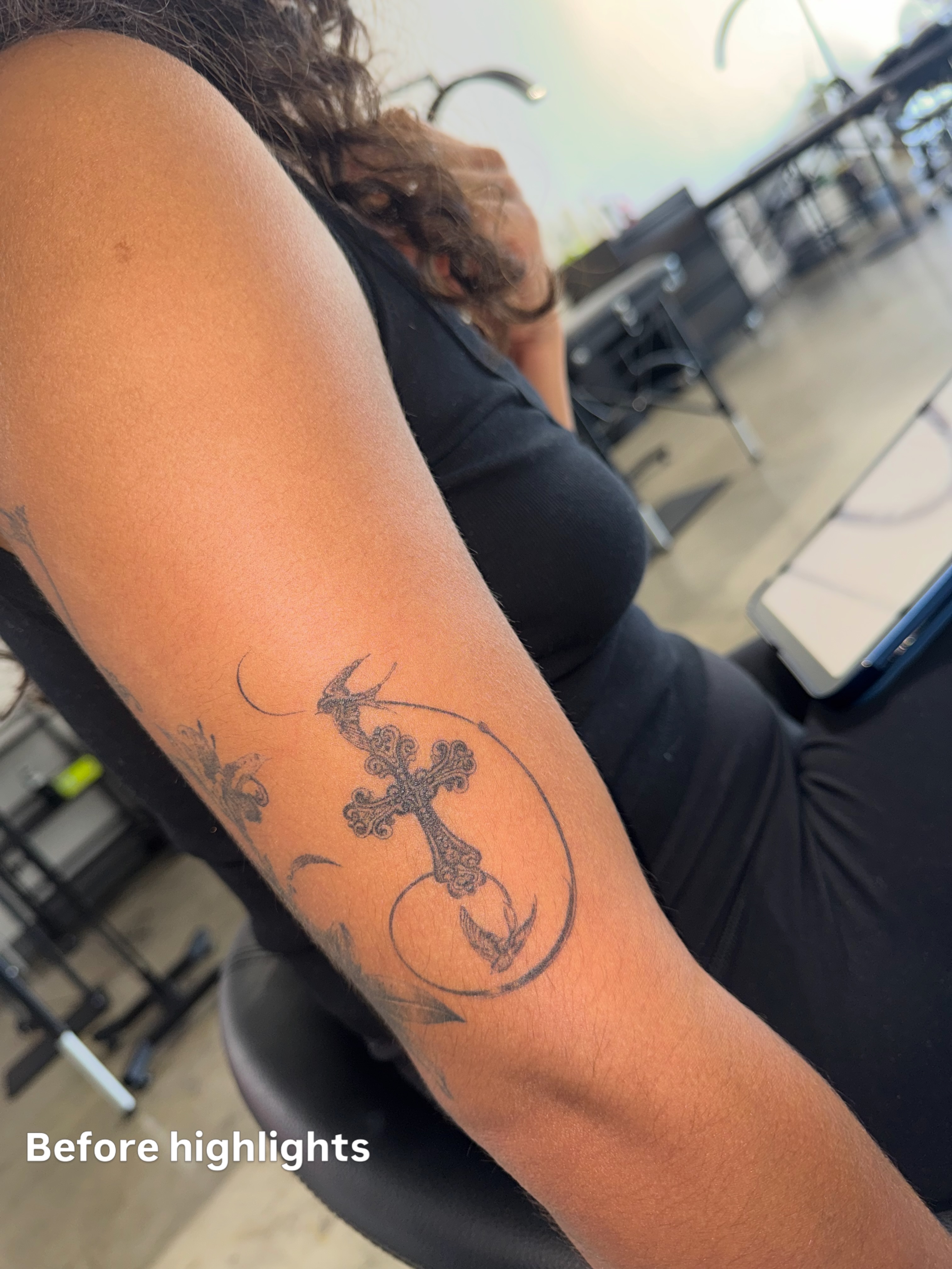 Cross with anchor black and grey tattoo on the forearm by Ava De La Torre