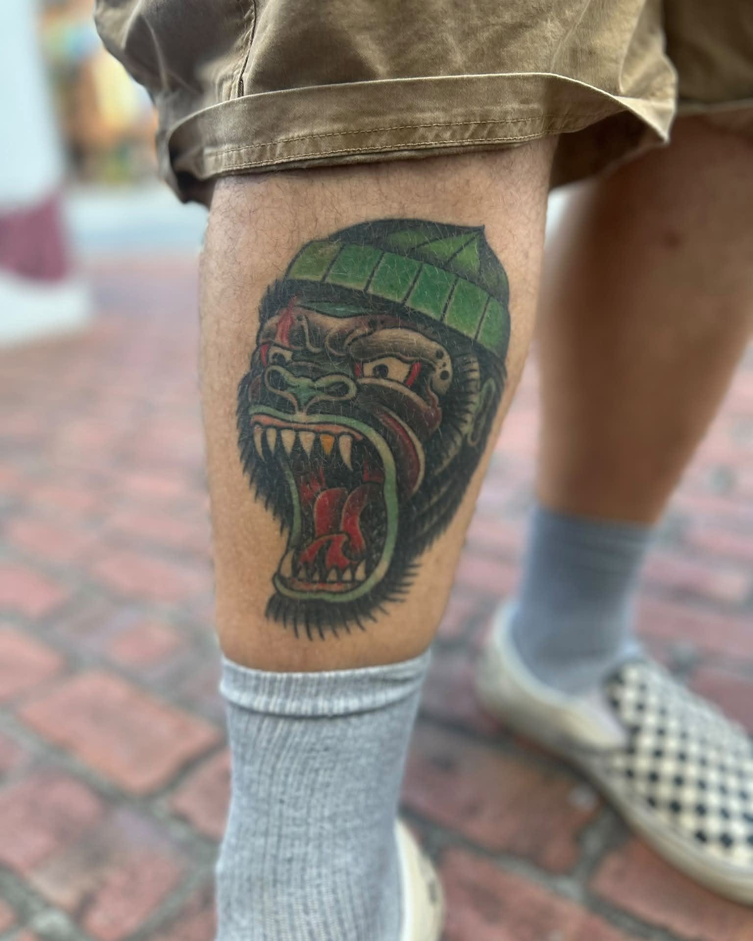 Gorilla American traditional tattoo on the thigh by Daemion