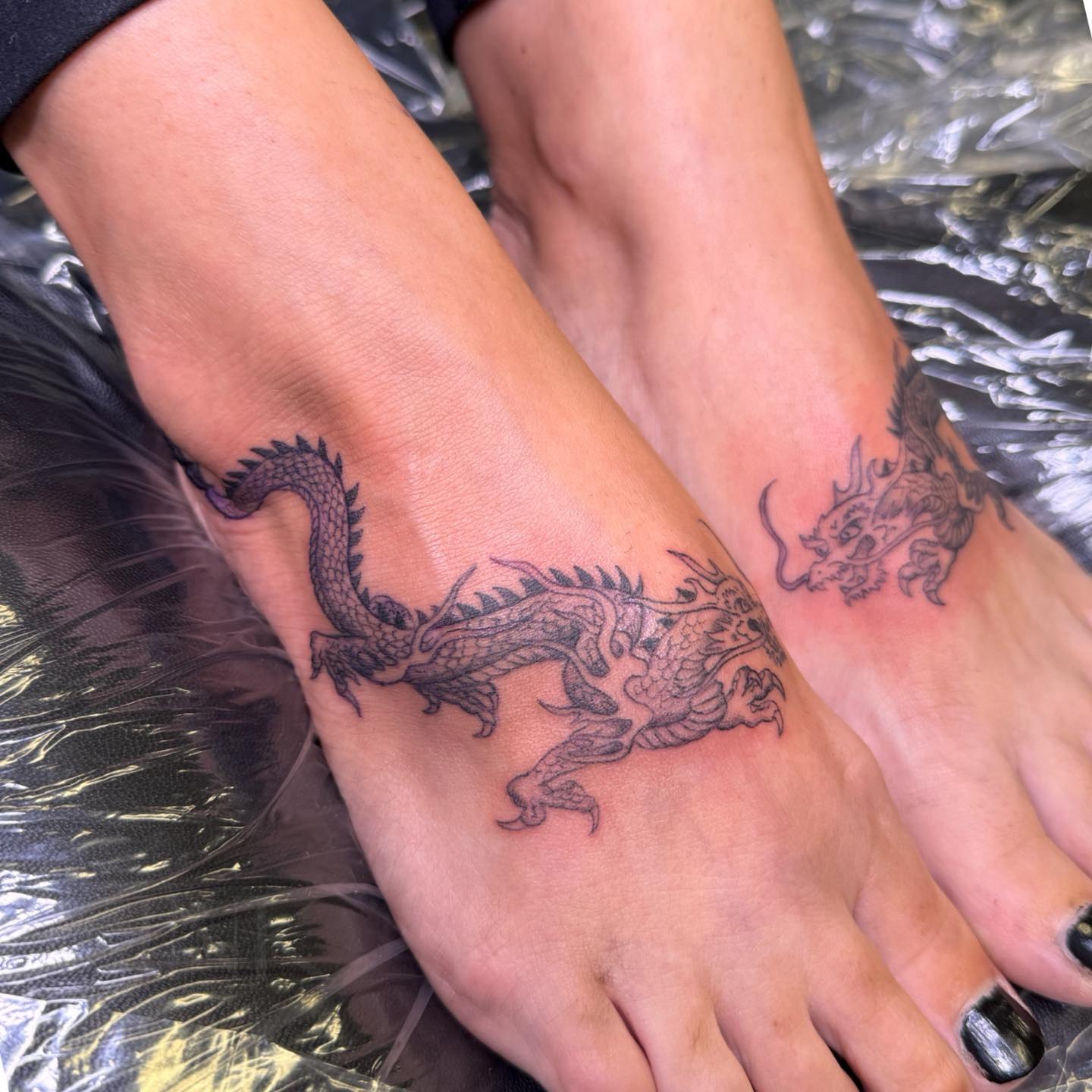 Dragon black and grey tattoo on the foot by PxINK, Crystal, Minnesota