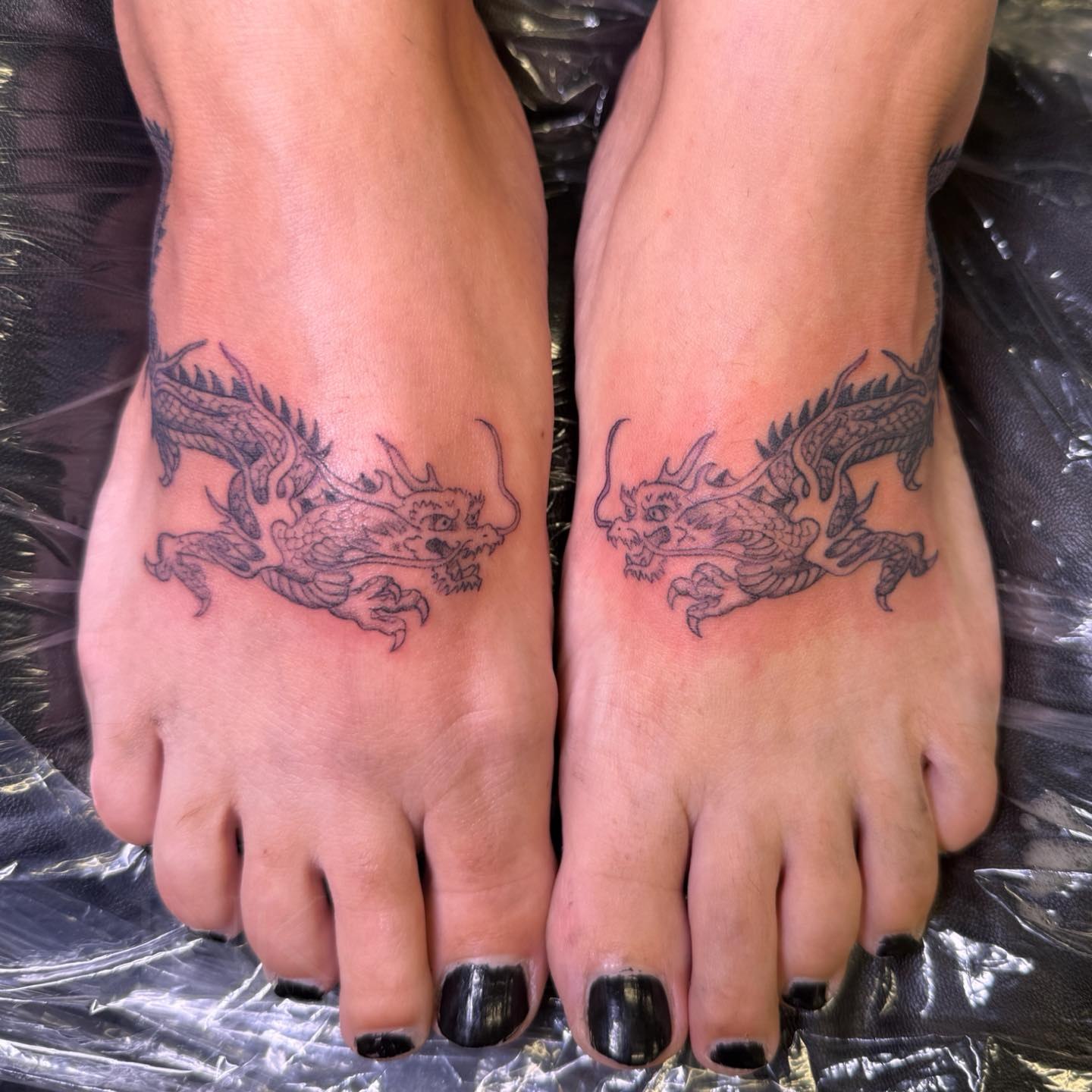Dragon black and grey tattoo on the foot by PxINK, Crystal, Minnesota