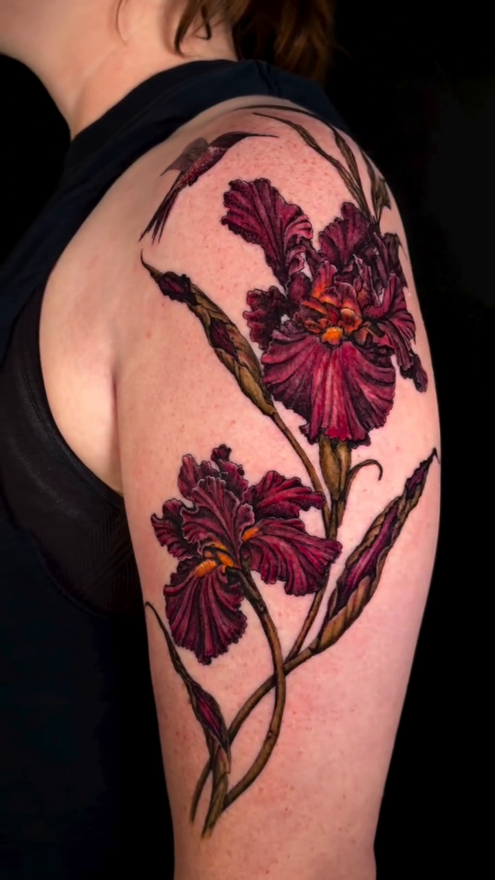 Irises and hummingbird realism tattoo by Jessica Sheahan