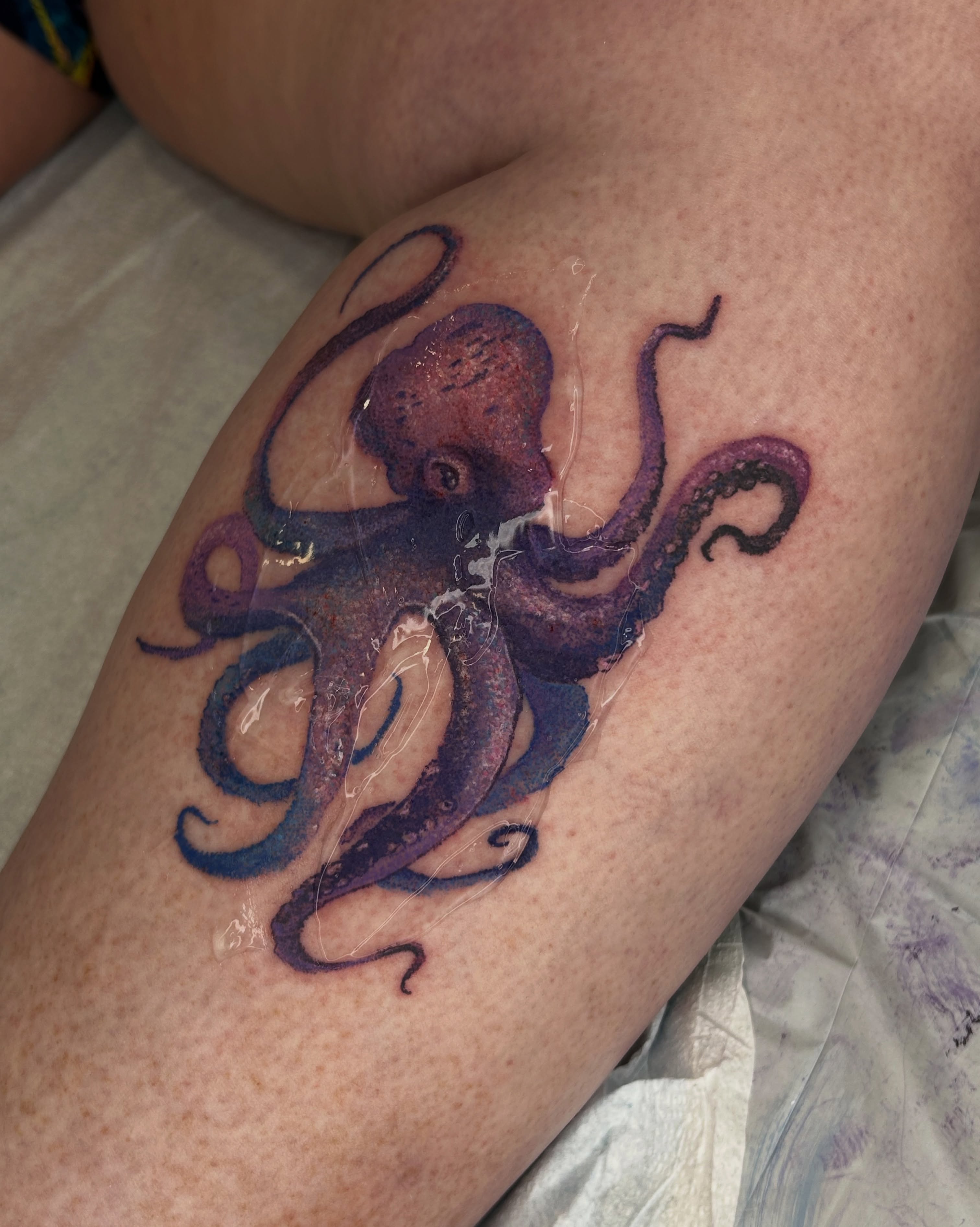 Octopus realism tattoo on the forearm by Ka hiu chiu