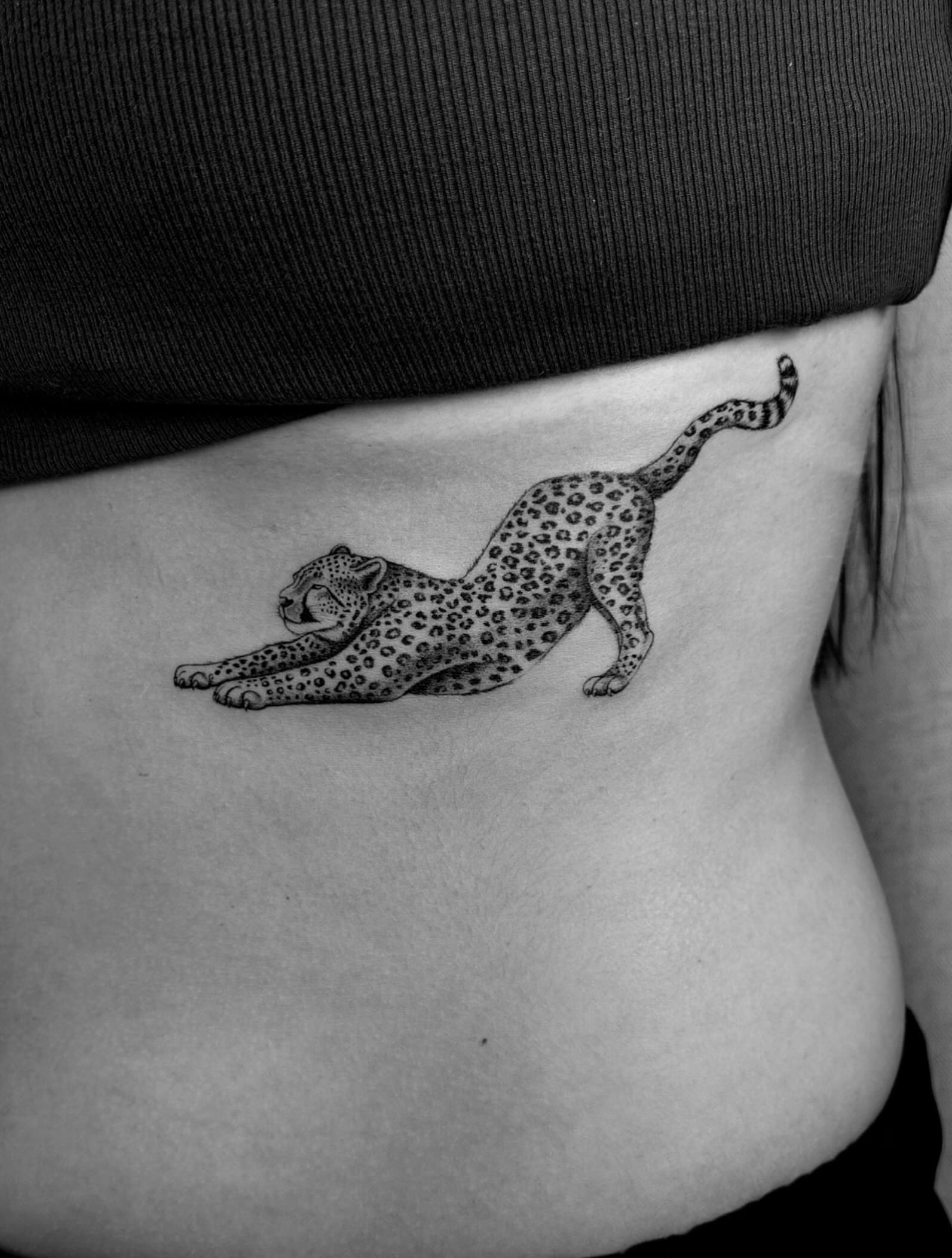 Cheetah black and grey tattoo on the ribs by ꕥ LANA MOON TATU ꕥ