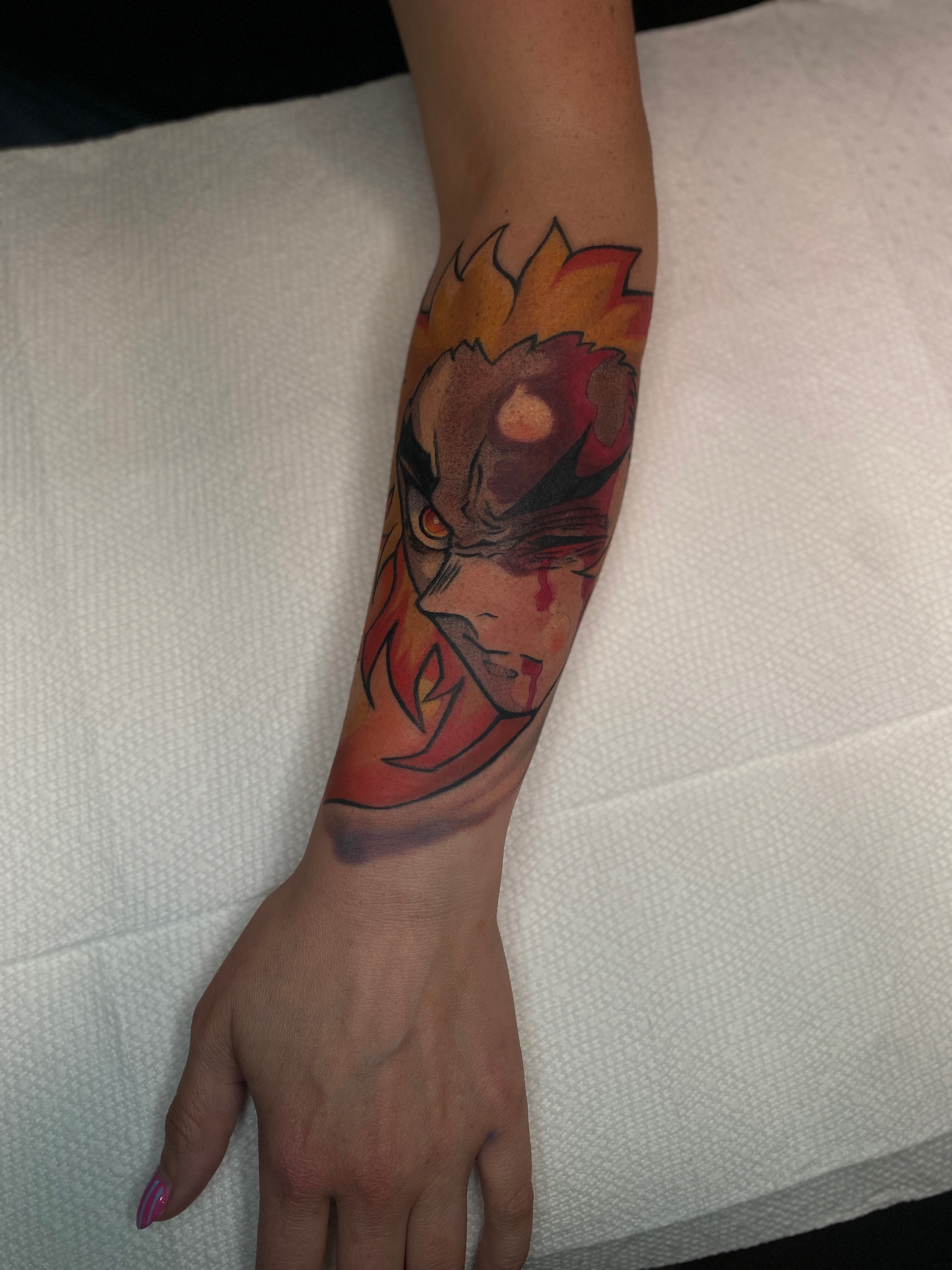 Anime character anime tattoo on the forearm by Kyle The Cartoon Guy