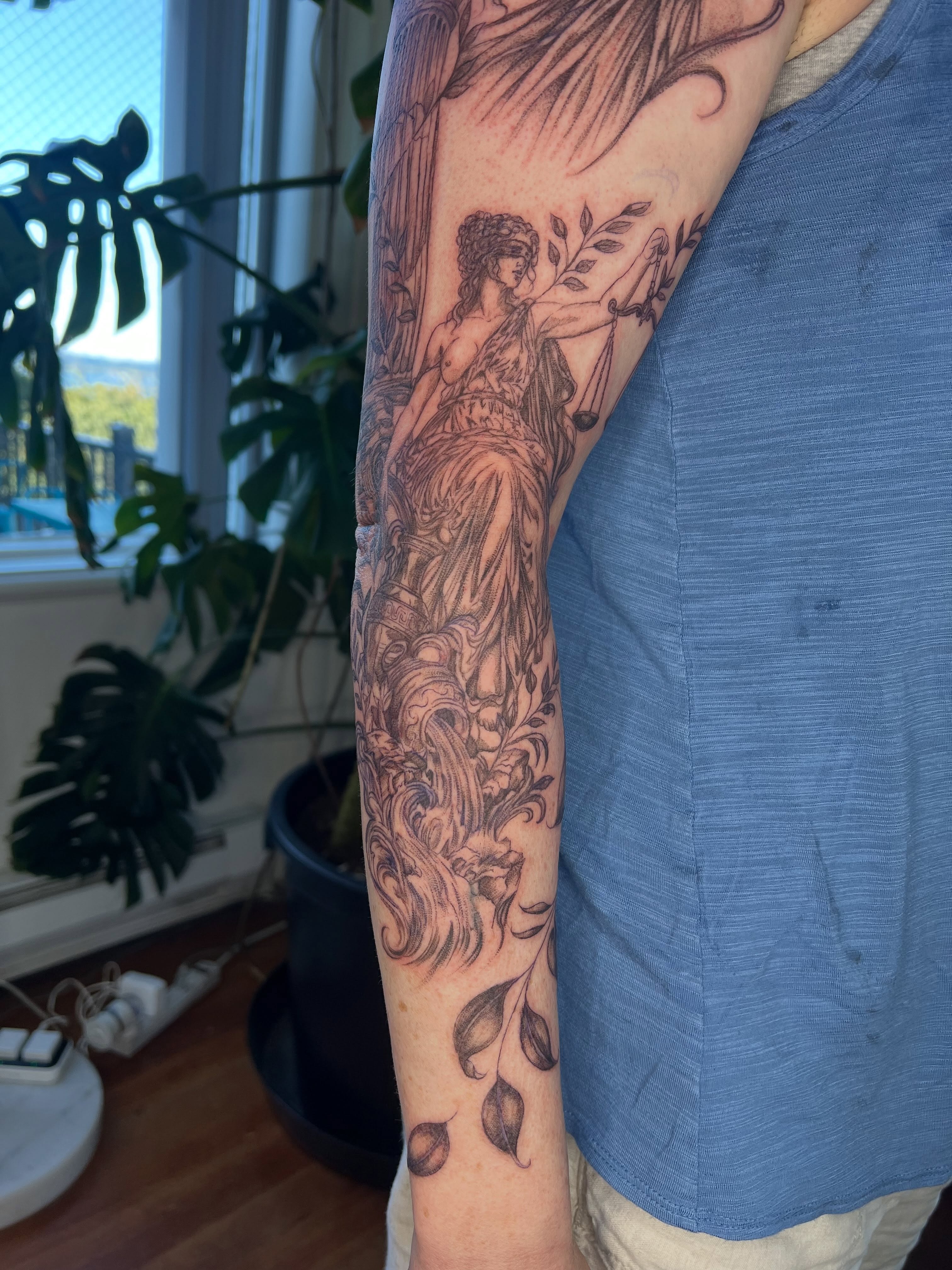 Justice figure realism tattoo on the forearm by Jordi WA Tacoma Tattooer