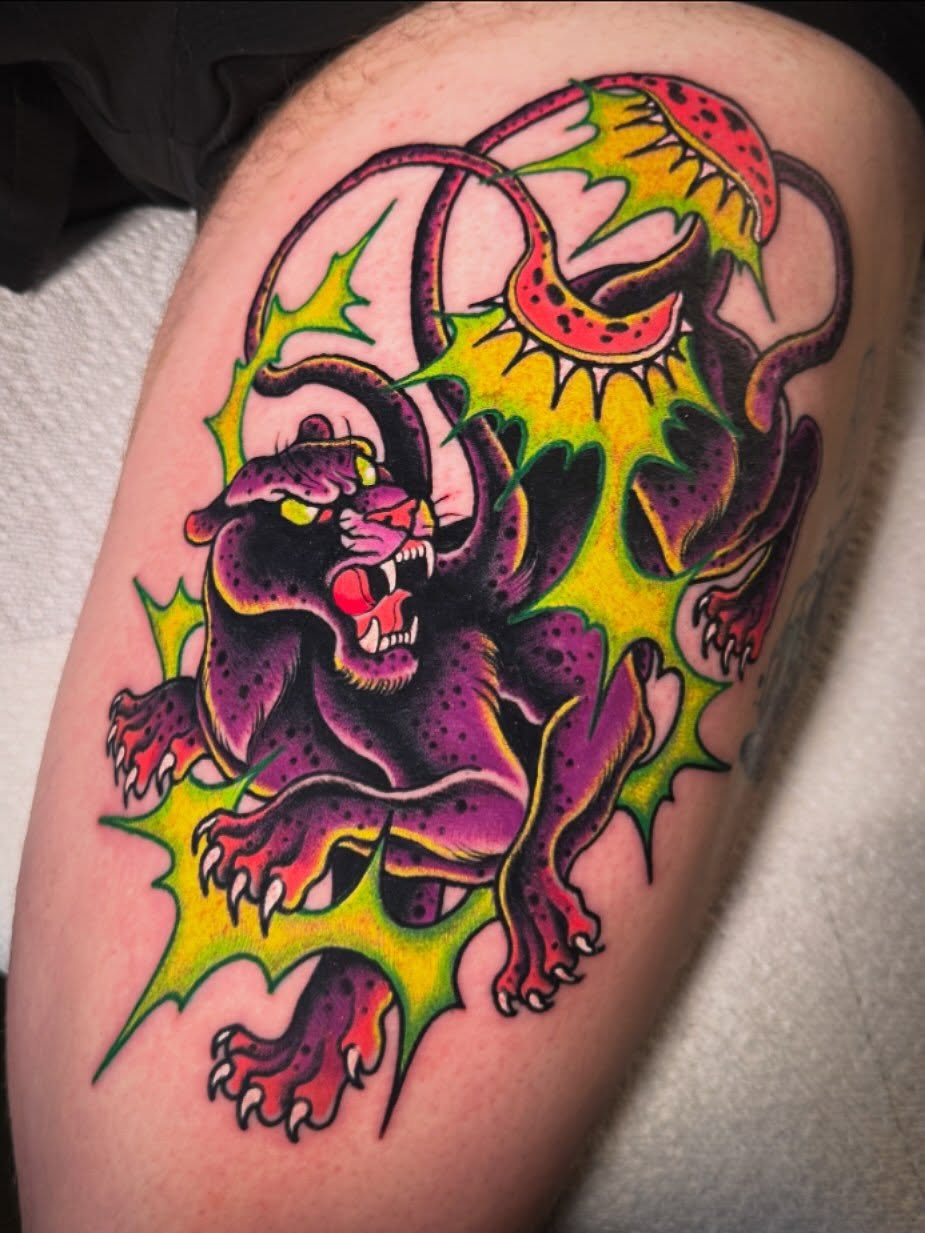 Panther American traditional tattoo on the thigh by Jess Longfield, Des Moines, Iowa