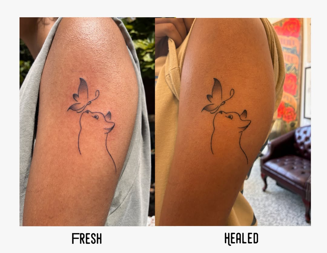 Dog and butterfly fine line tattoo on the upper arm by Xin.H