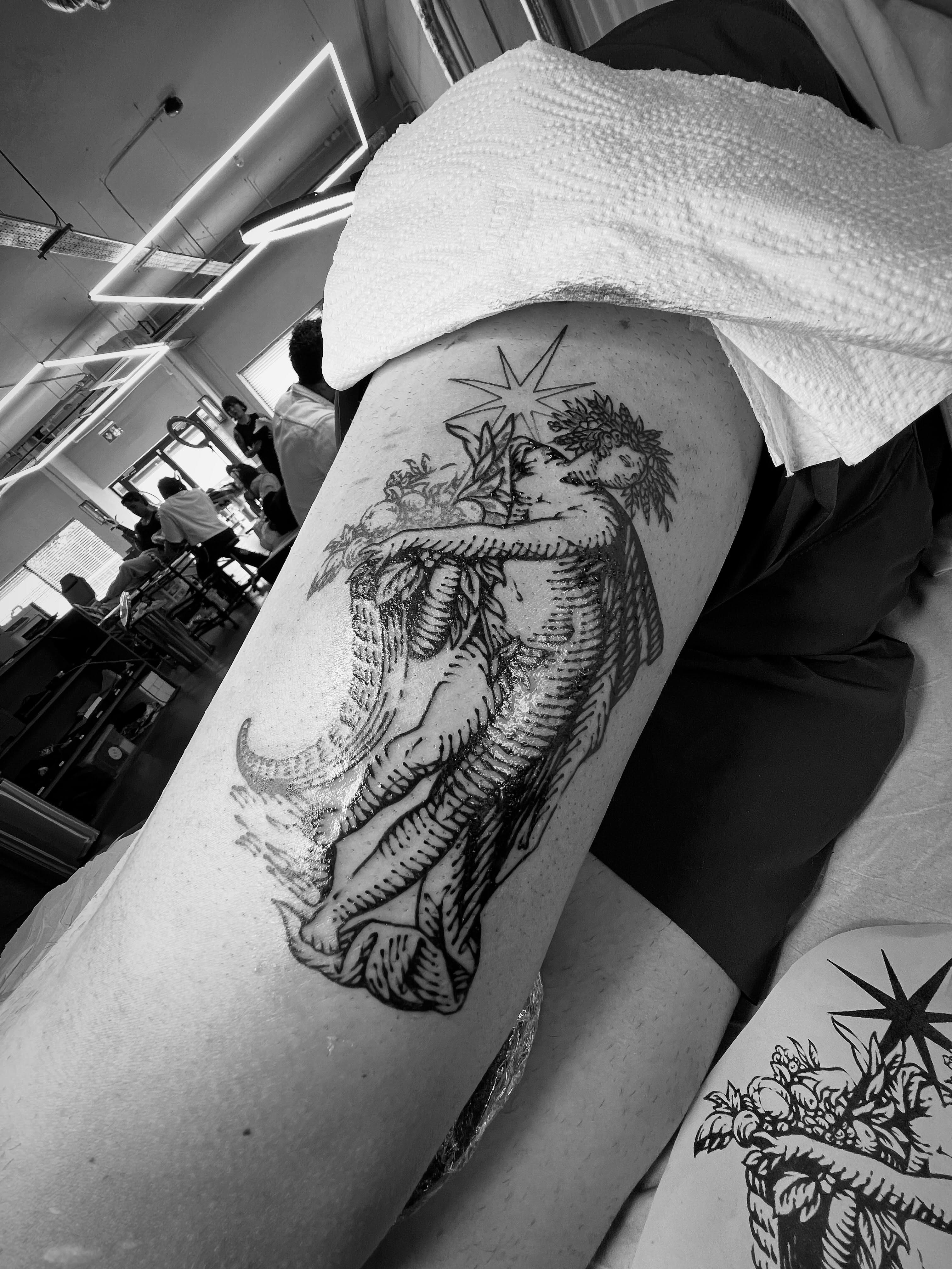 Mermaid and woman black and grey tattoo on the thigh by Wonny