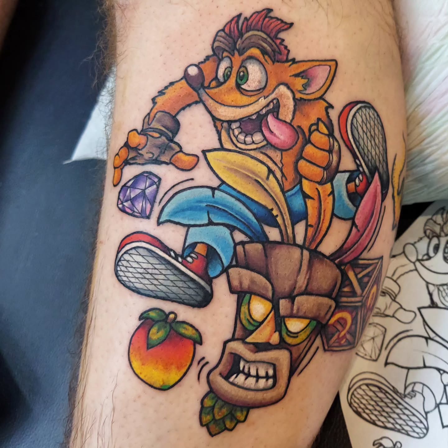 Crash bandicoot American traditional tattoo on the forearm by Kari Rhoades, Marion, Iowa