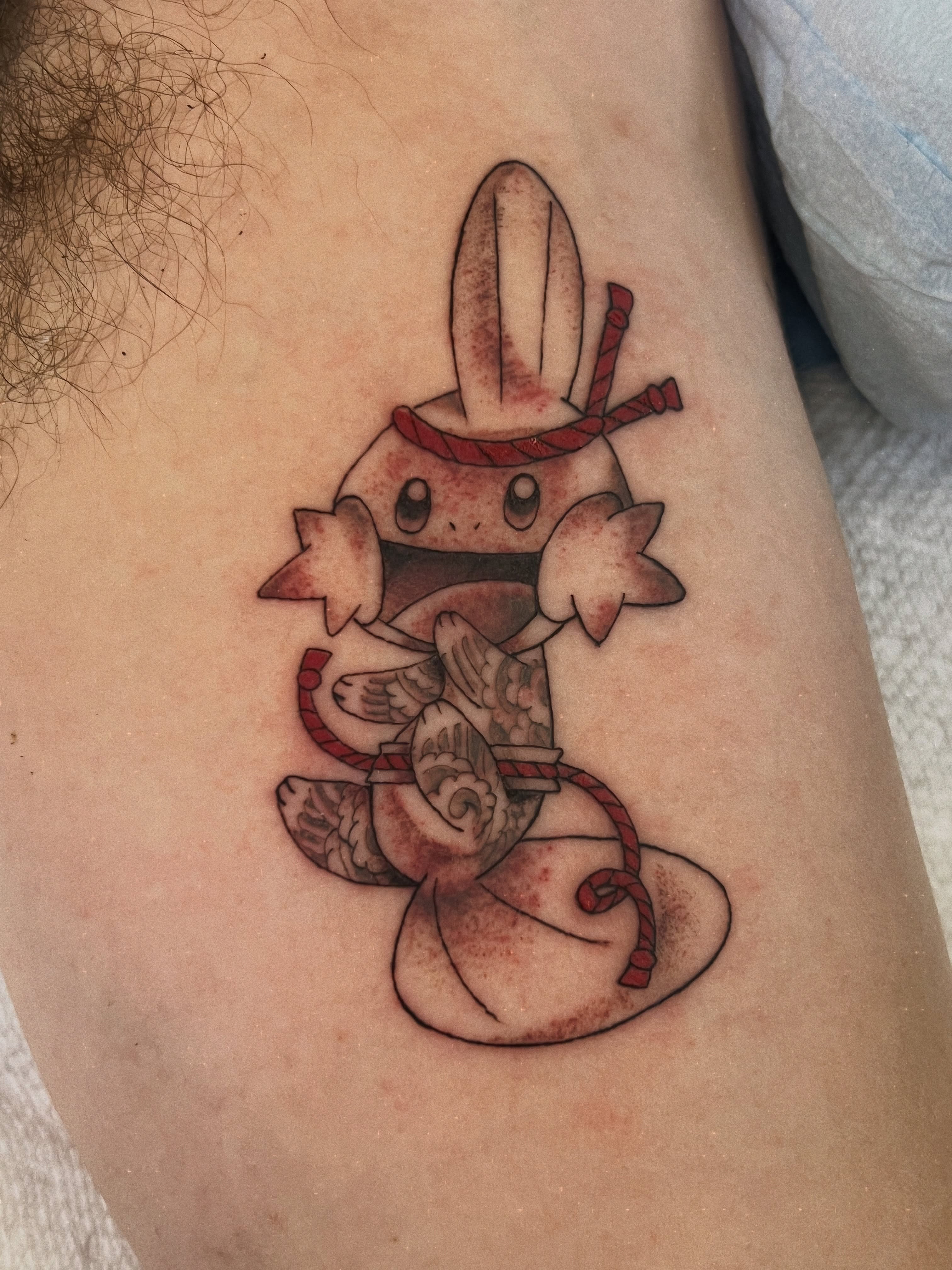 Charmander American traditional tattoo on the thigh by Andrea Patterson