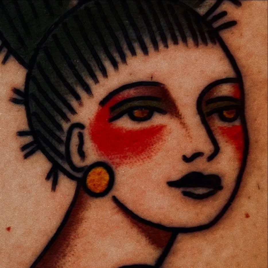 Woman's face American traditional tattoo on the head by ReadyFreddie_tattoo