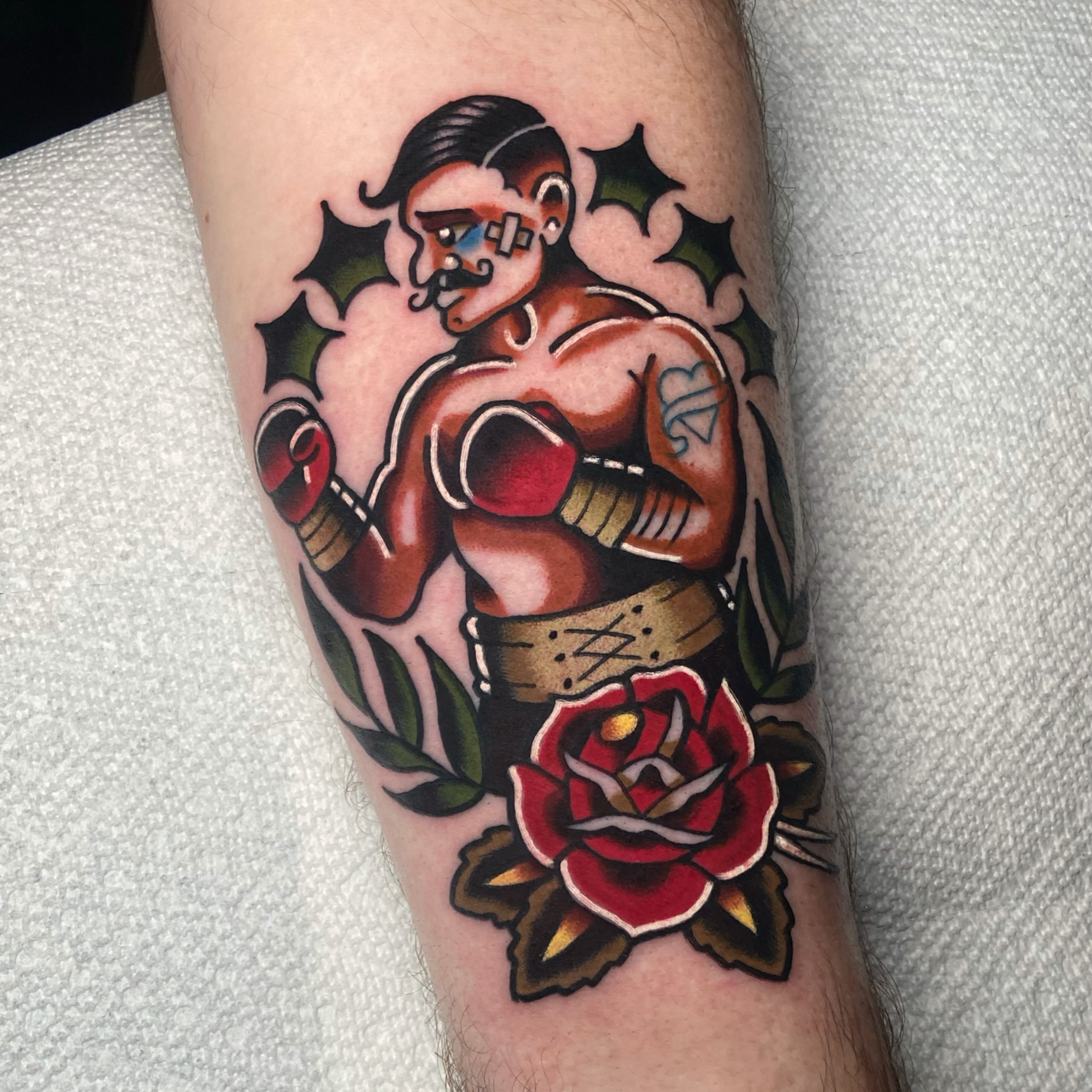 Boxing man with rose American traditional tattoo on the forearm by Matthew Limbers⚜️
