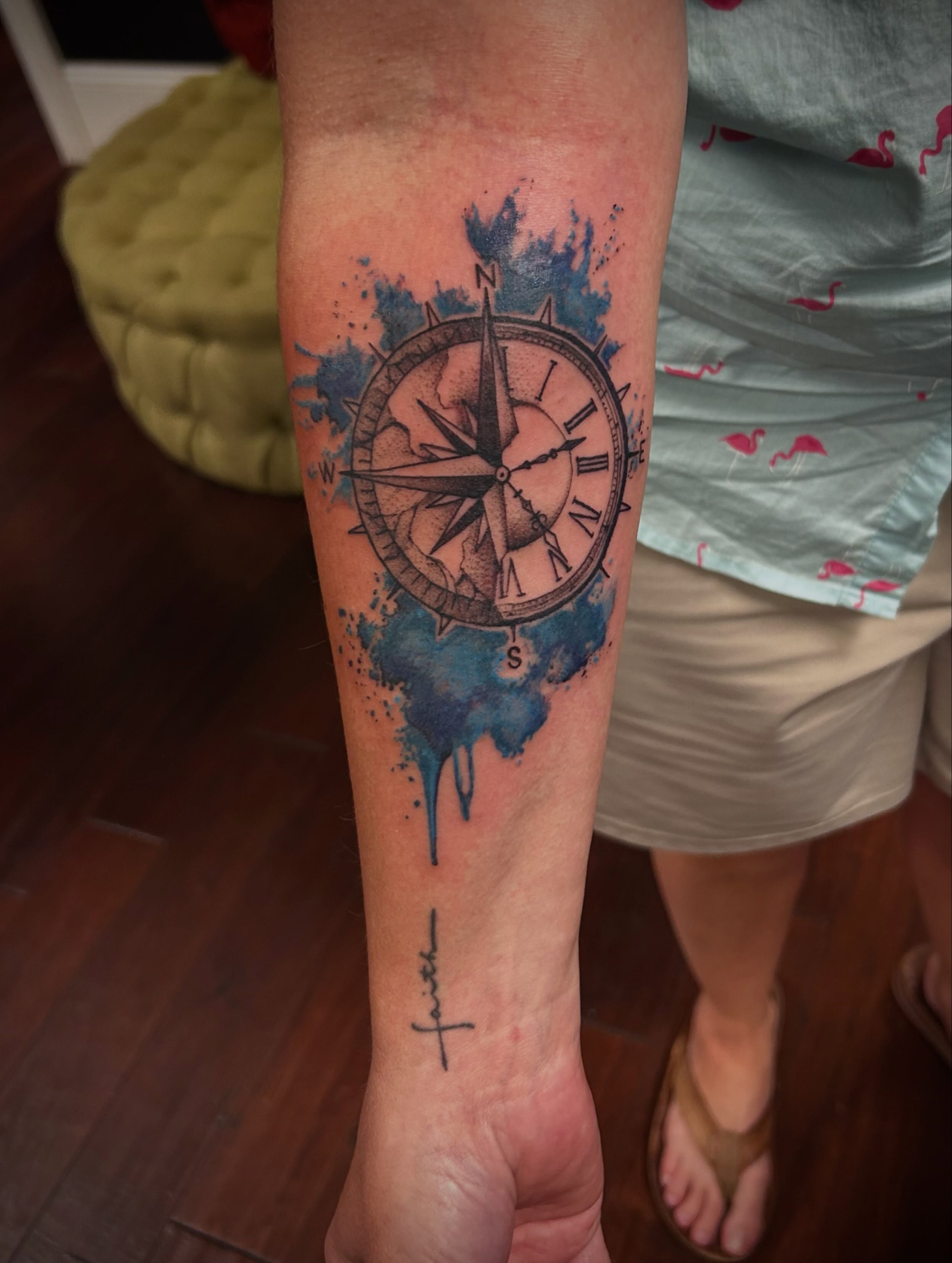 Compass watercolor tattoo on the forearm by Jon Byrd