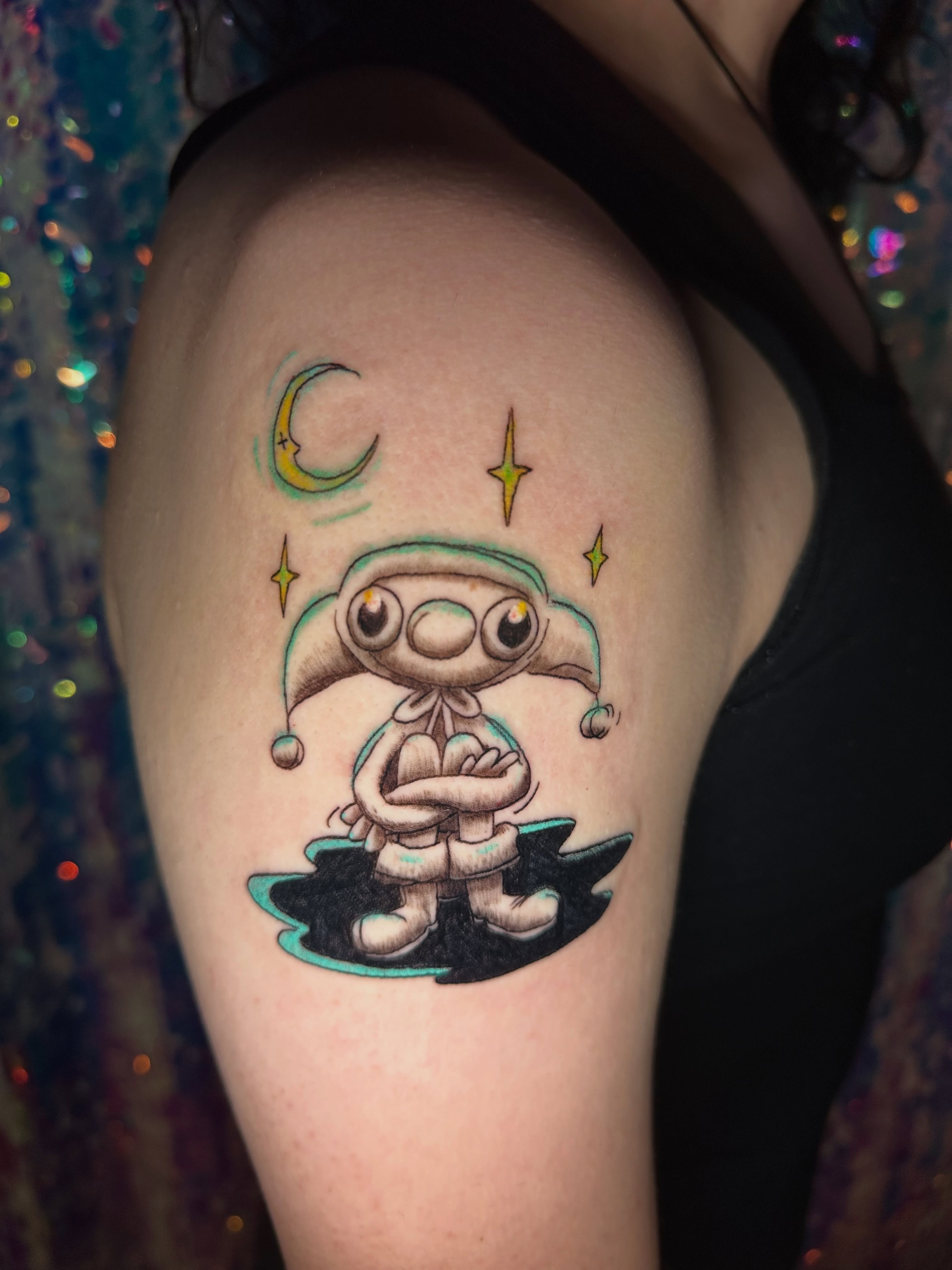 Alien illustrative tattoo on the shoulder by Sunny, Austin, Texas