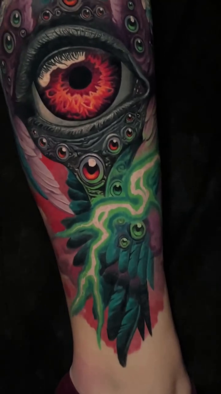 All-seeing eye with wings dark realism tattoo by Sean Foy