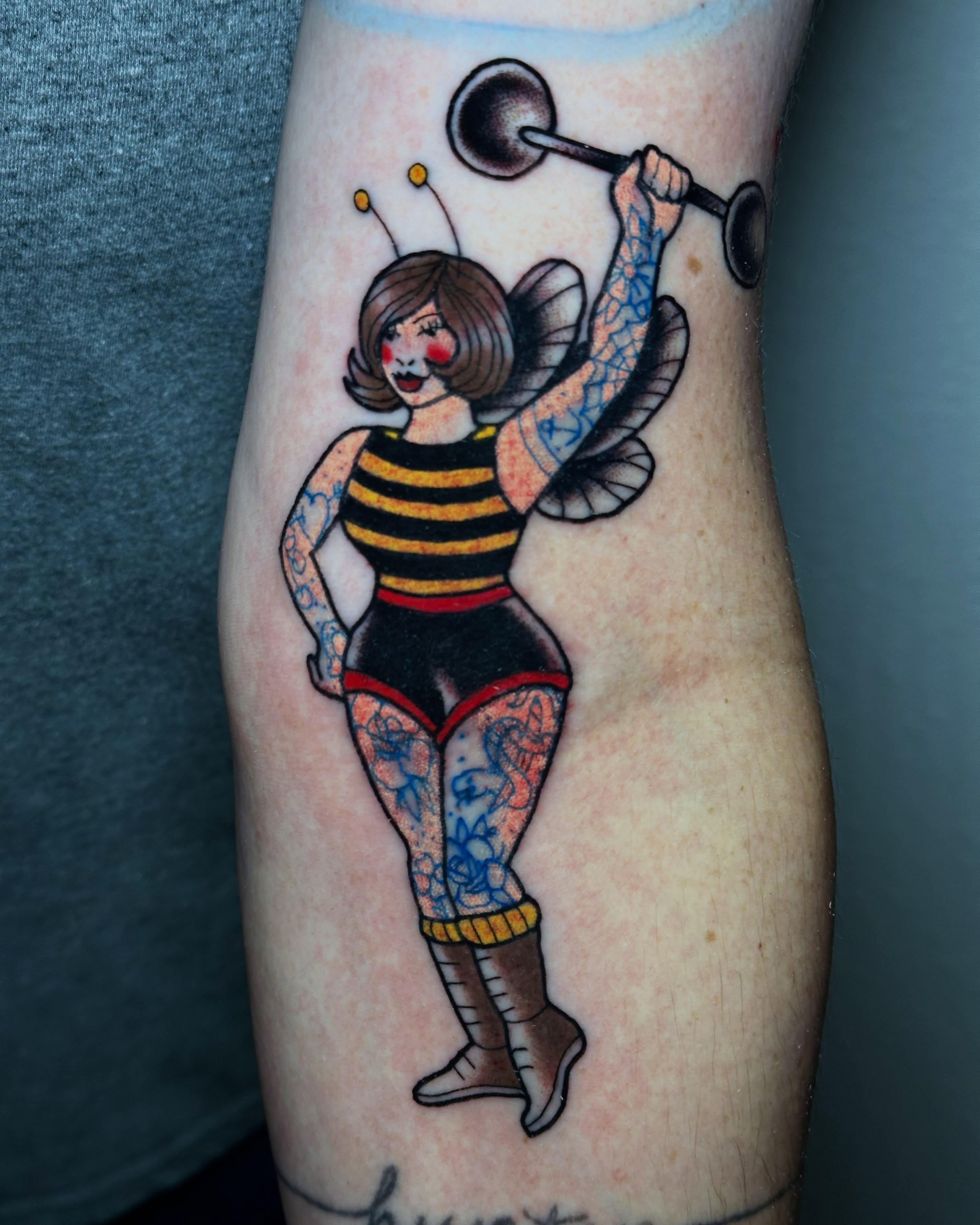 Bee girl American traditional tattoo on the forearm by Liz McDonald