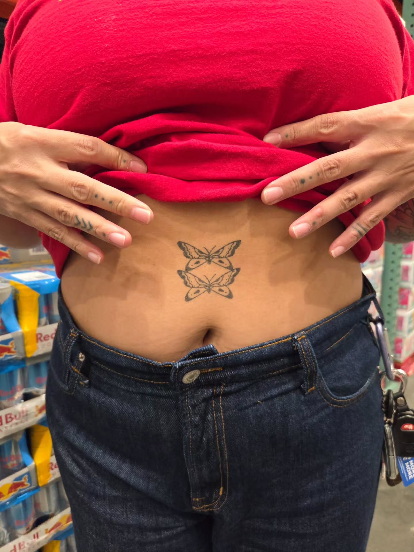 Butterfly geometric tattoo on the torso by jules tattoos