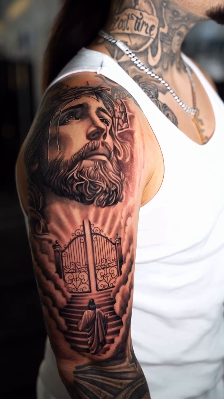 Jesus Christ and the Pearly Gates realism tattoo by Charlotte Tattoo Artist