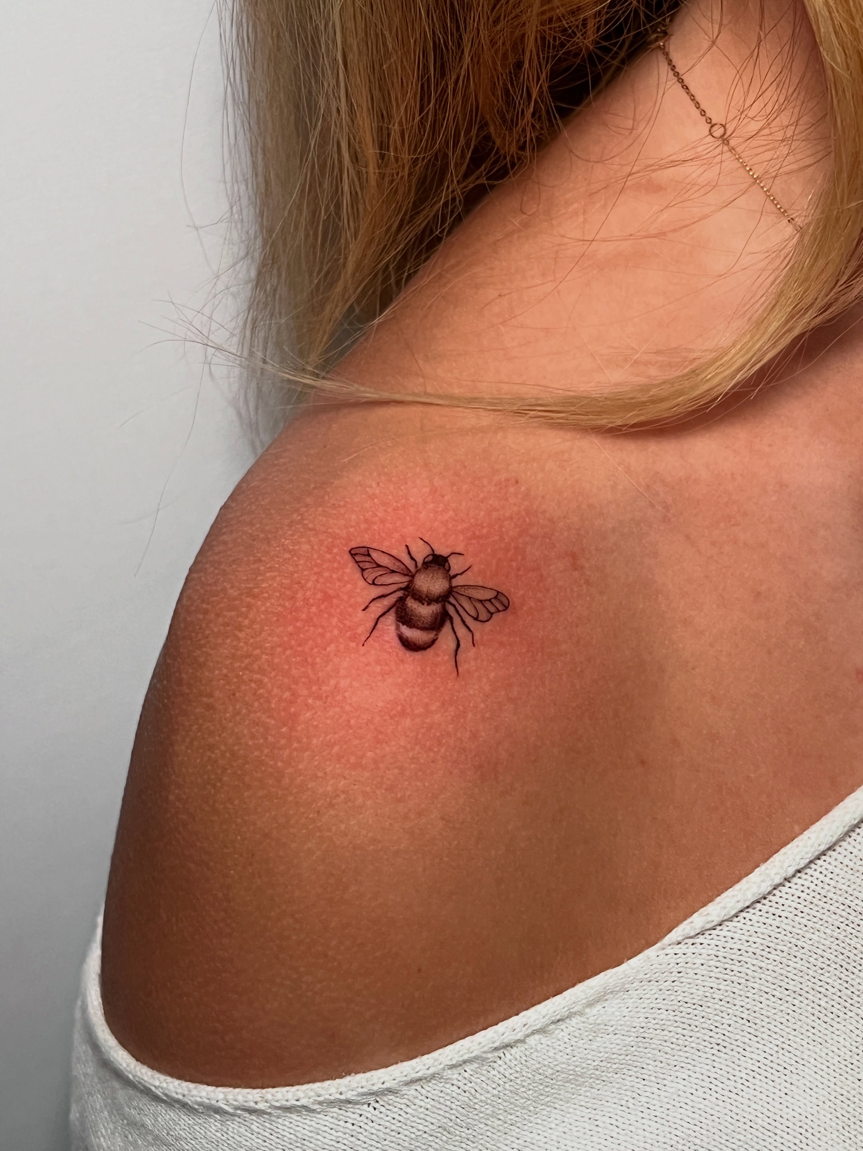 Bee dotwork tattoo on the shoulder by Eleana, North Miami, Florida