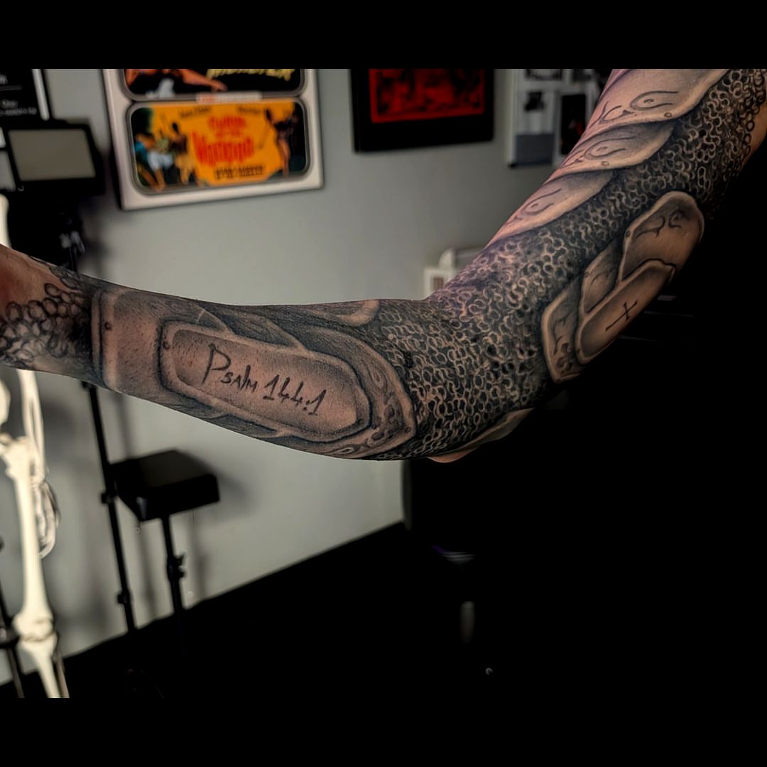 Psalm 144:1 black and grey tattoo on the forearm by Dave Chercourt, Willoughby, Ohio