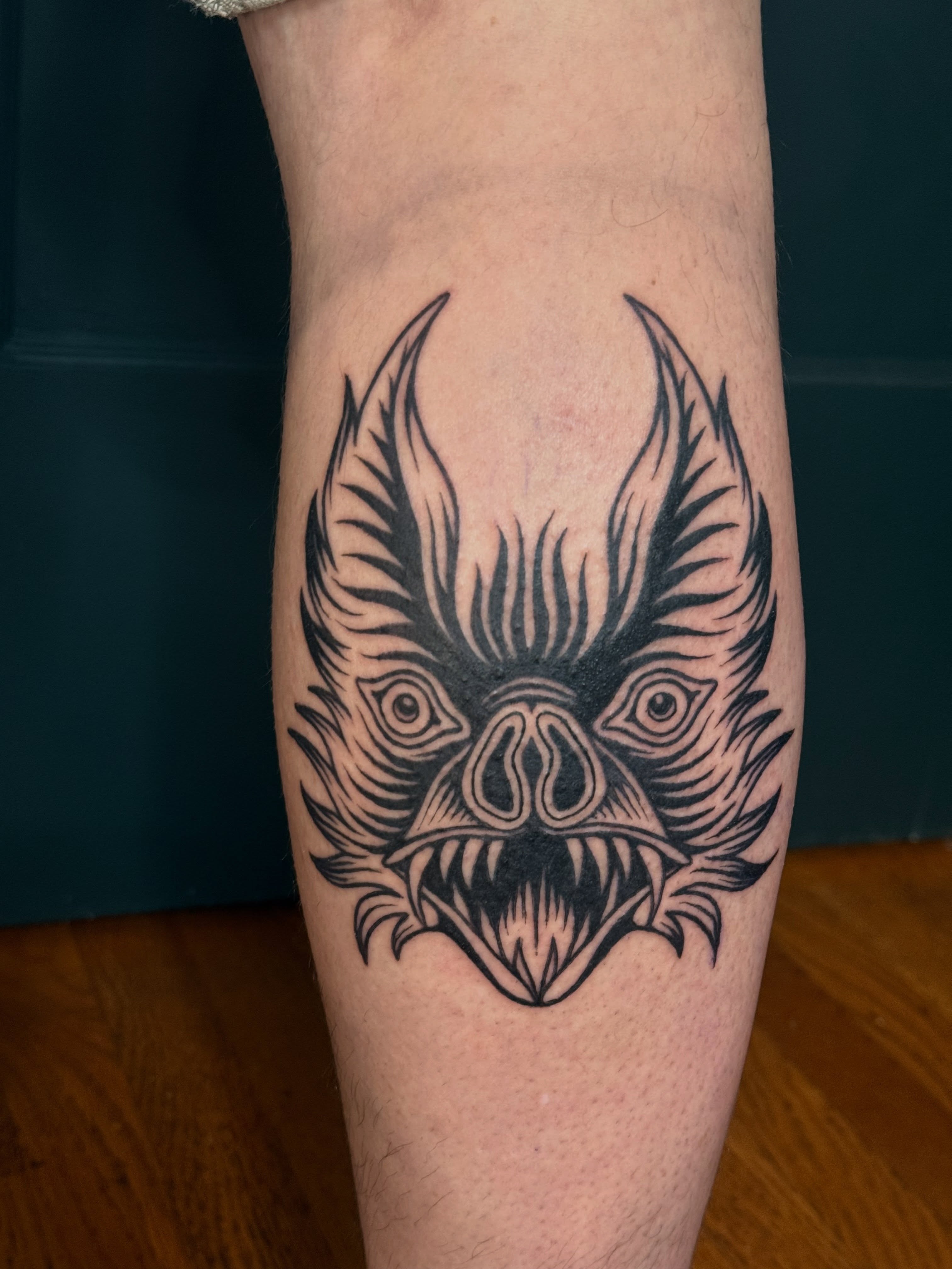 Owl black and grey tattoo on the forearm by Paul DeVay