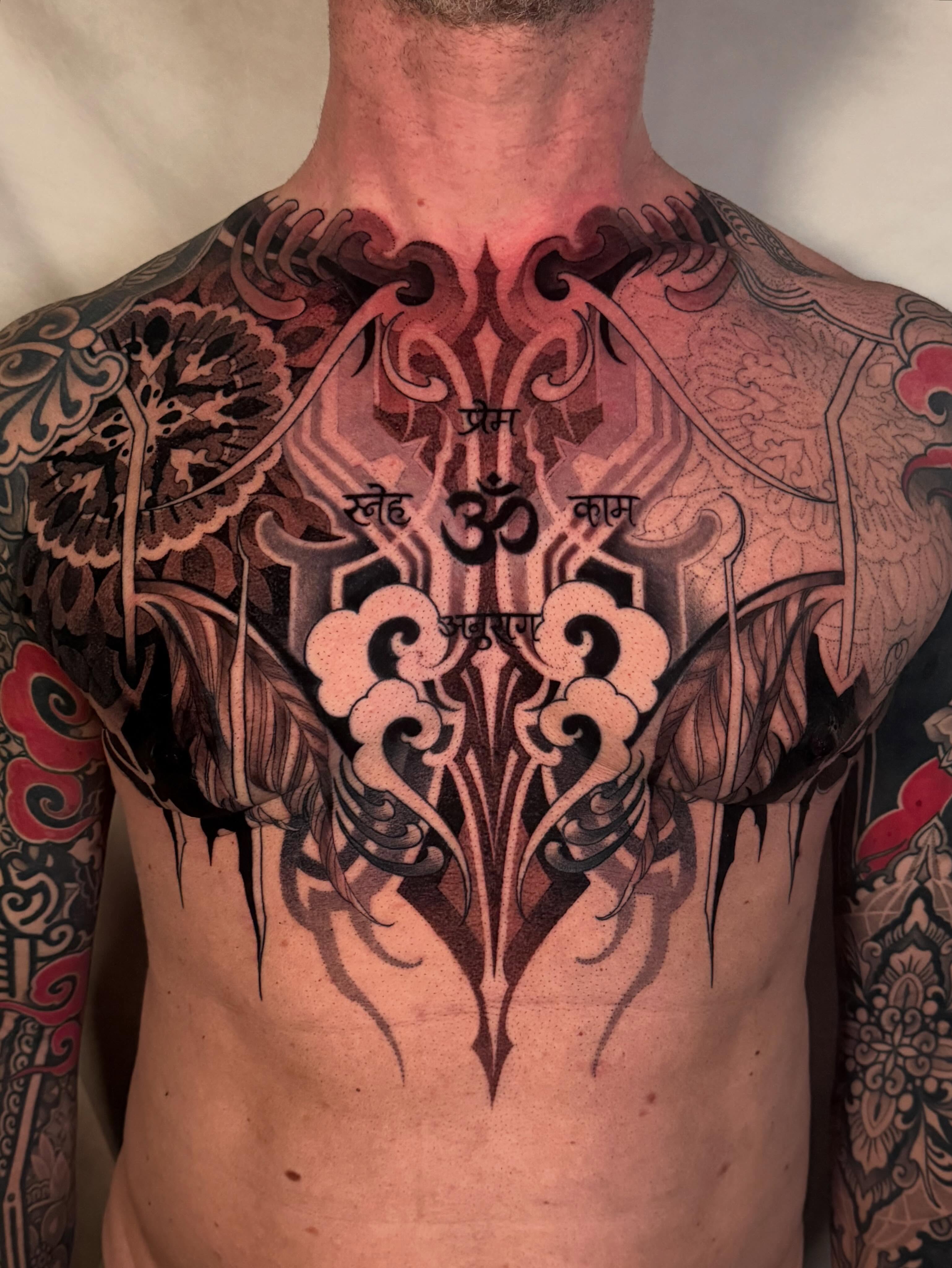 Geometric design geometric tattoo on the chest by <