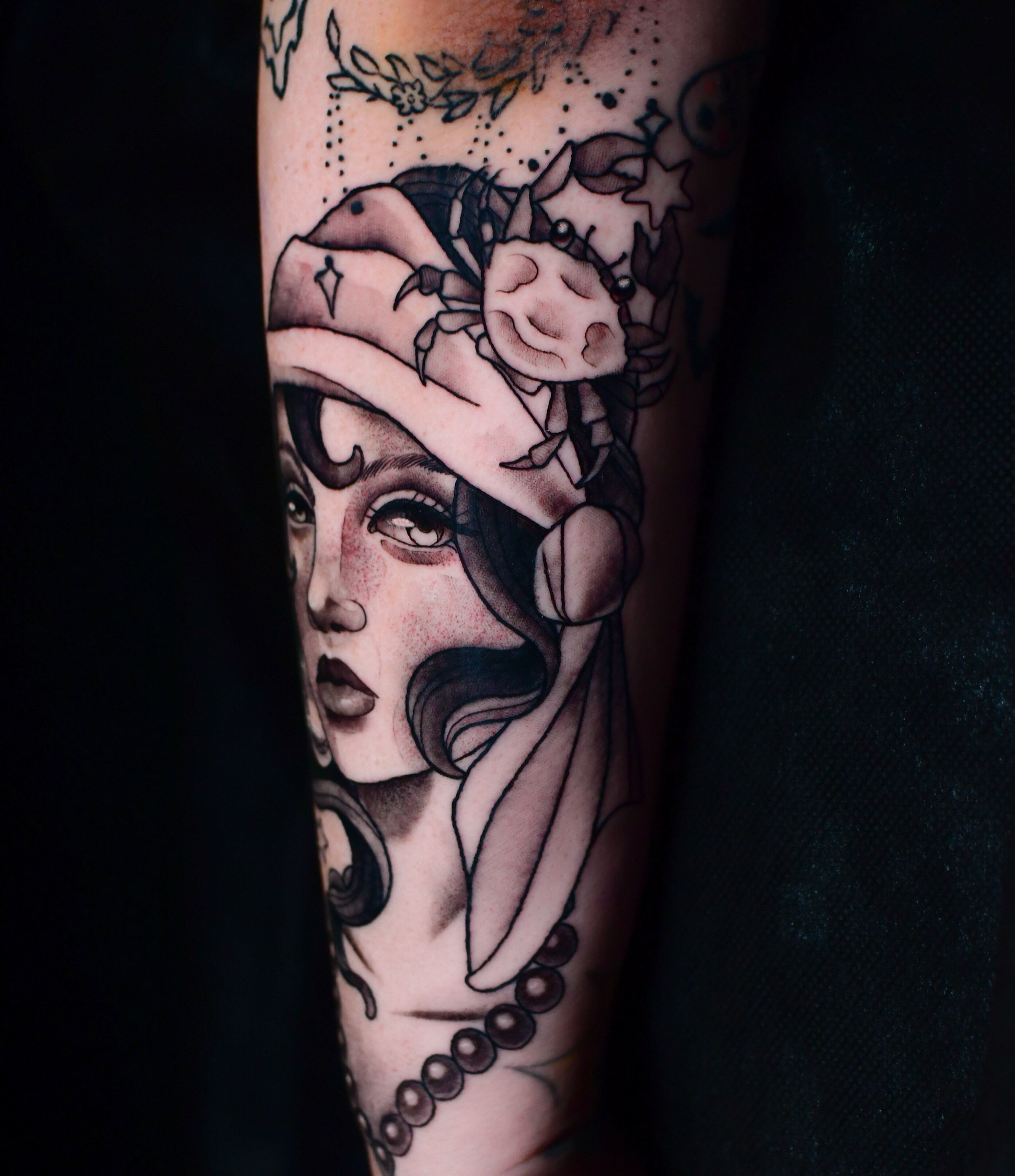 Woman's portrait American traditional tattoo on the forearm by Karina πΌ Orange County Tattoo Artist