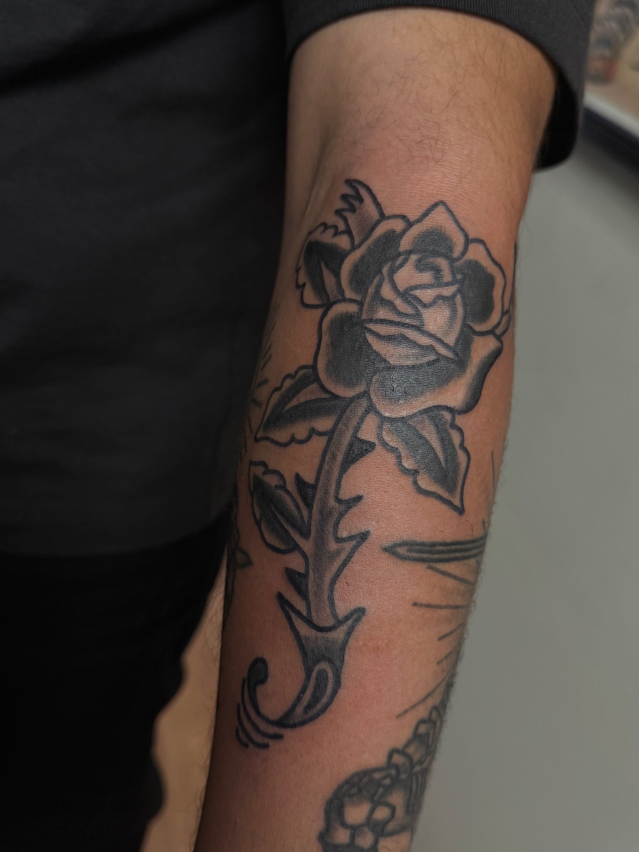 Rose black and grey tattoo on the forearm by @kevingaretz, Jersey City, New Jersey