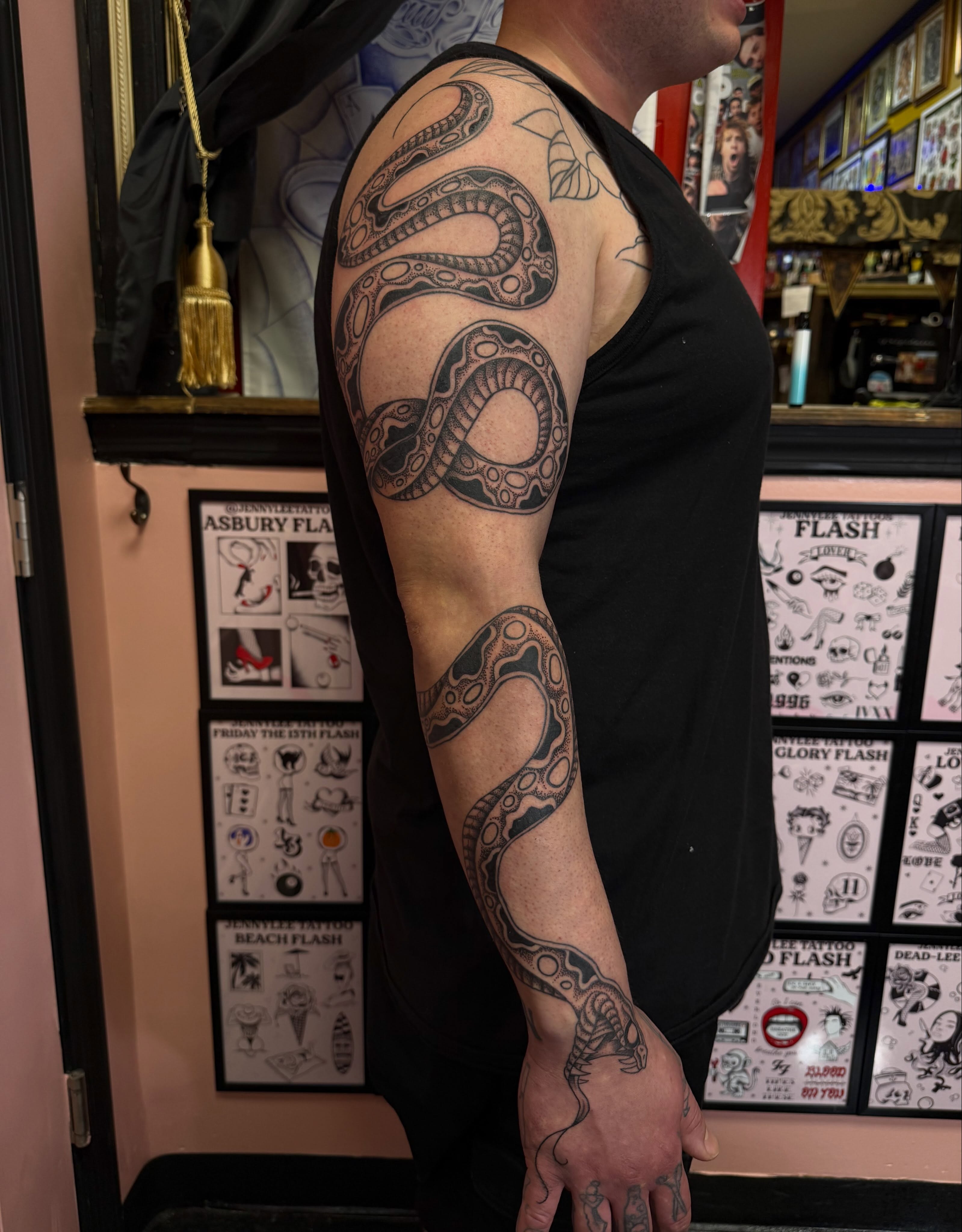 Snake black and grey tattoo on the upper arm by Jennylee Aerts, Asbury Park, New Jersey