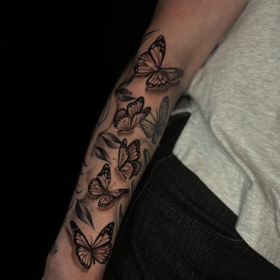 Butterflies black and grey tattoo on the forearm by @_frankyvee
