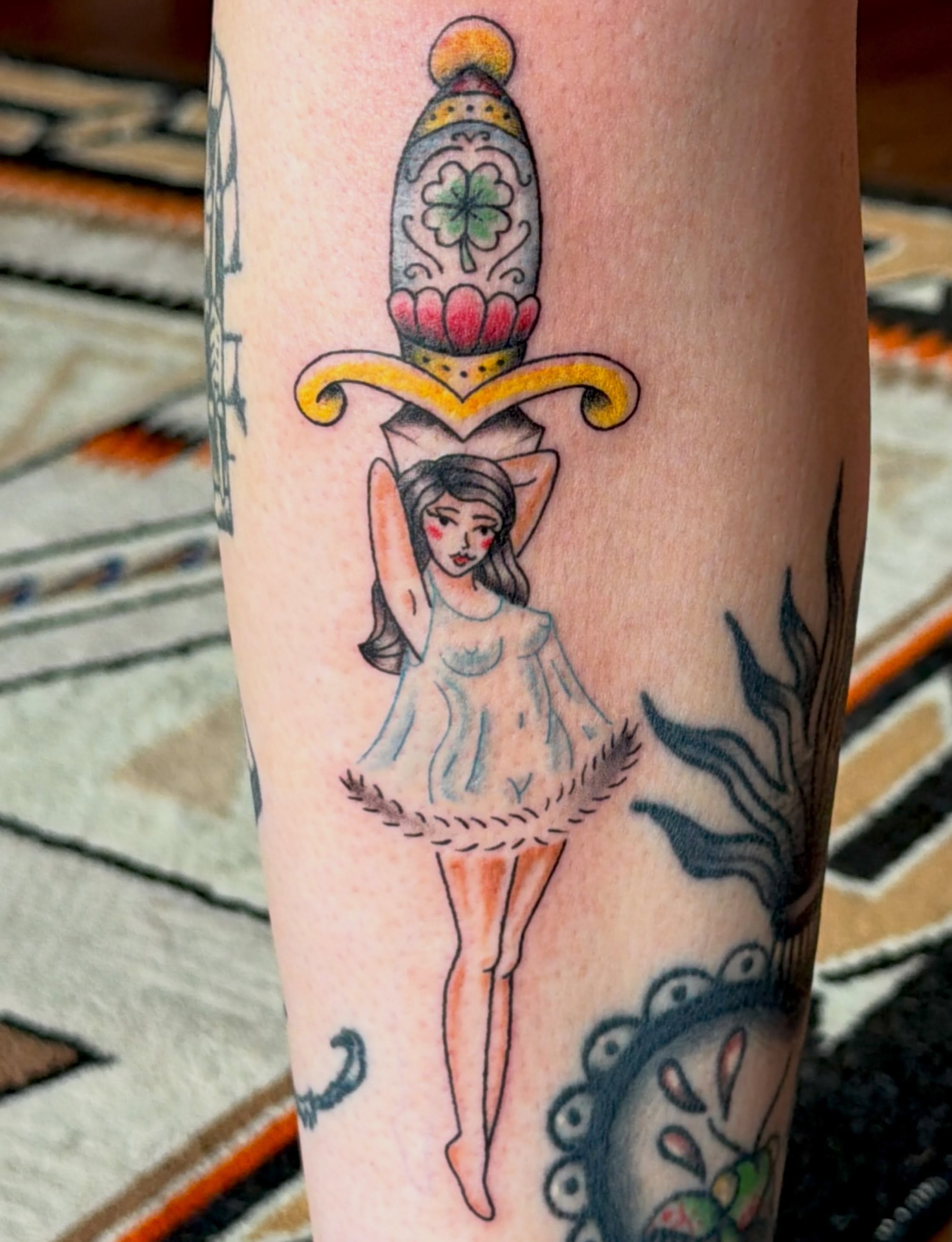 Ballerina and dagger American traditional tattoo on the forearm by Alaska ⚜️